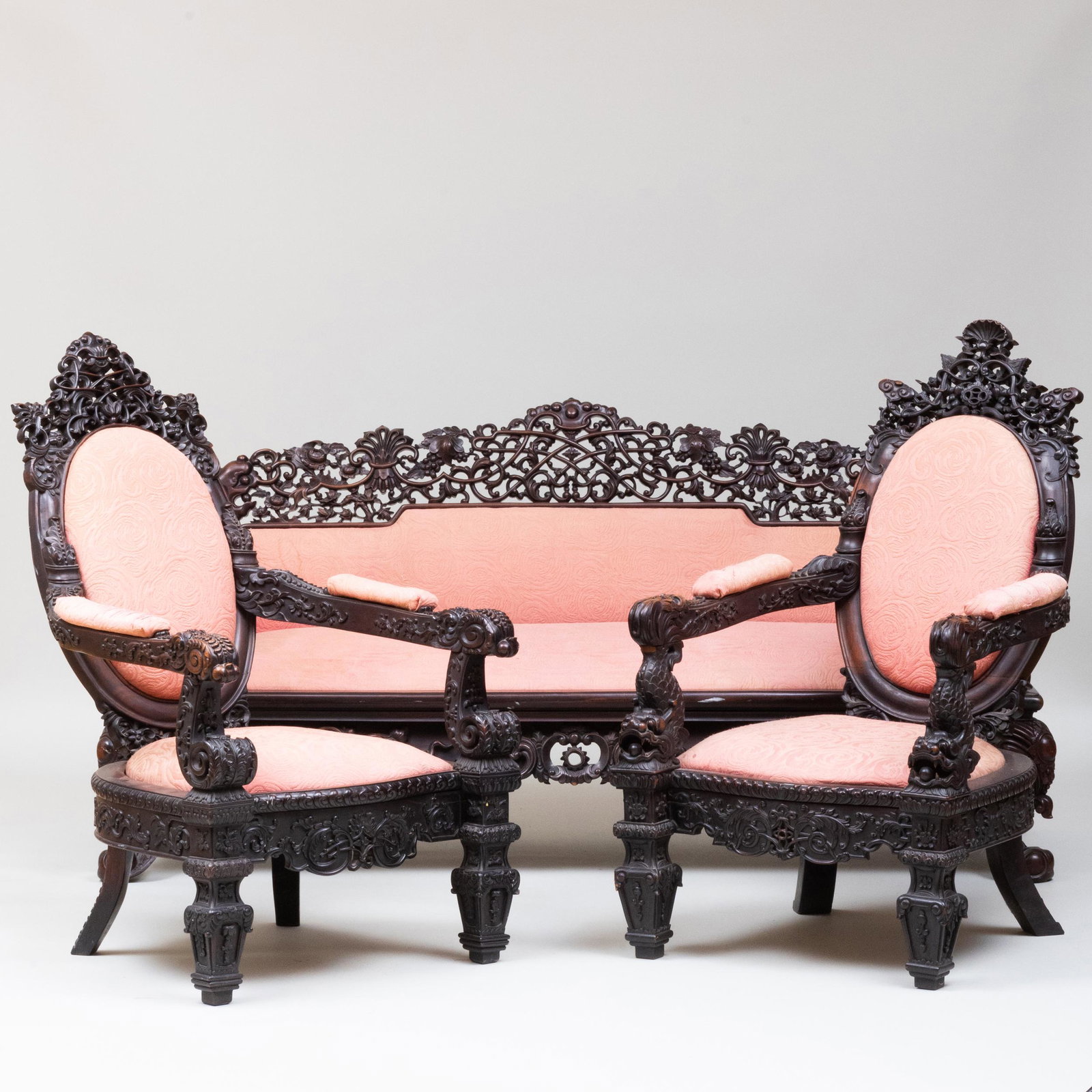 Chinese Export Carved Hardwood and Upholstered Parlor: Chinese Export Carved Hardwood and Upholstered Parlor Set Comprising:A pair of armchairs, 45 3/4 x 28 1/2 x 31 in., height of seat 14 1/2 in.A settee, 36 x 6 ft. 5 in. x 28 in.For a similar example se
