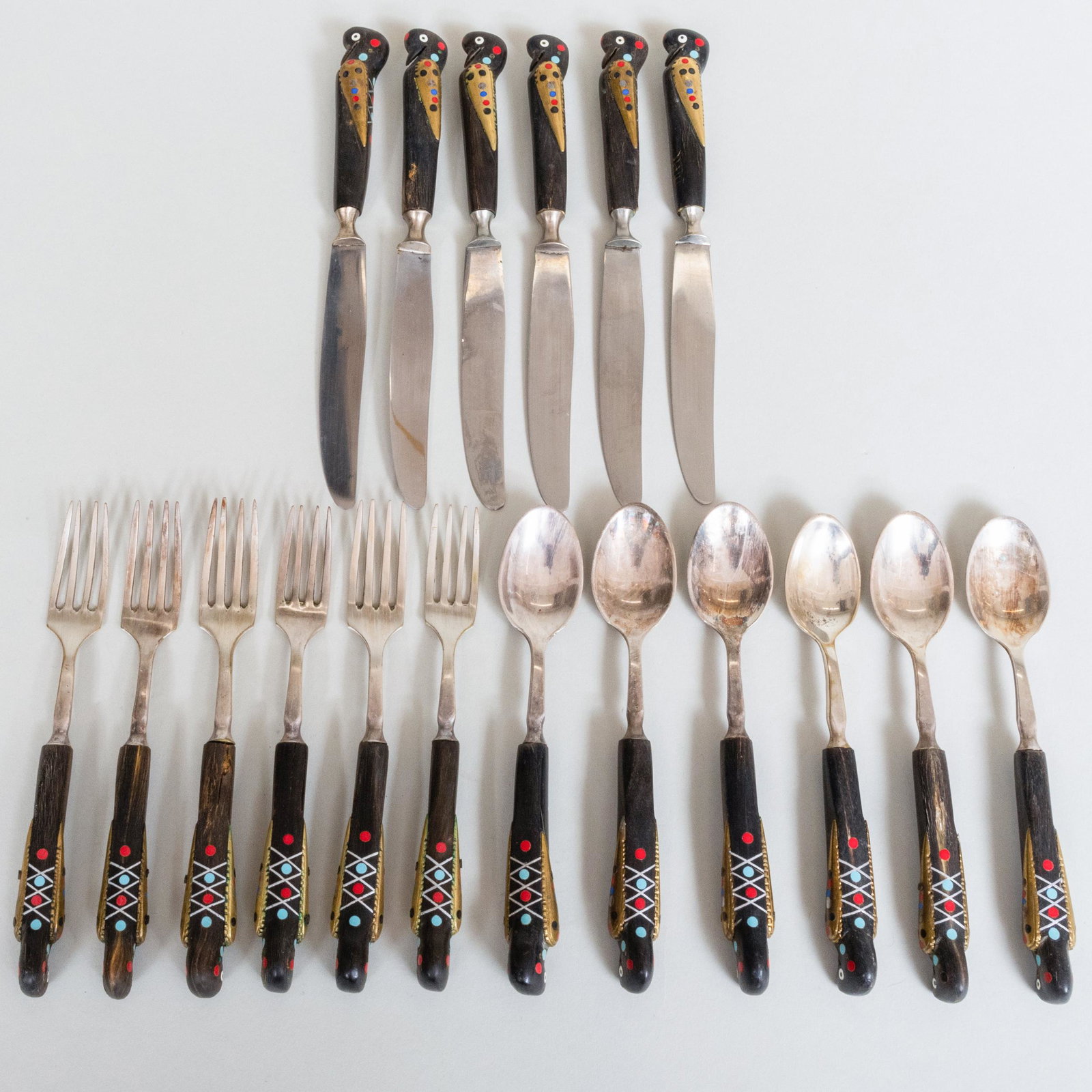 Set of Silver Plate and Inlaid Wood 'Bird' Flatware: Set of Silver Plate and Inlaid Wood 'Bird' Flatware Unmarked. Comprising: Set of six knives Set of six forks Set of six spoons The knives 7 in. long, (18 pcs).