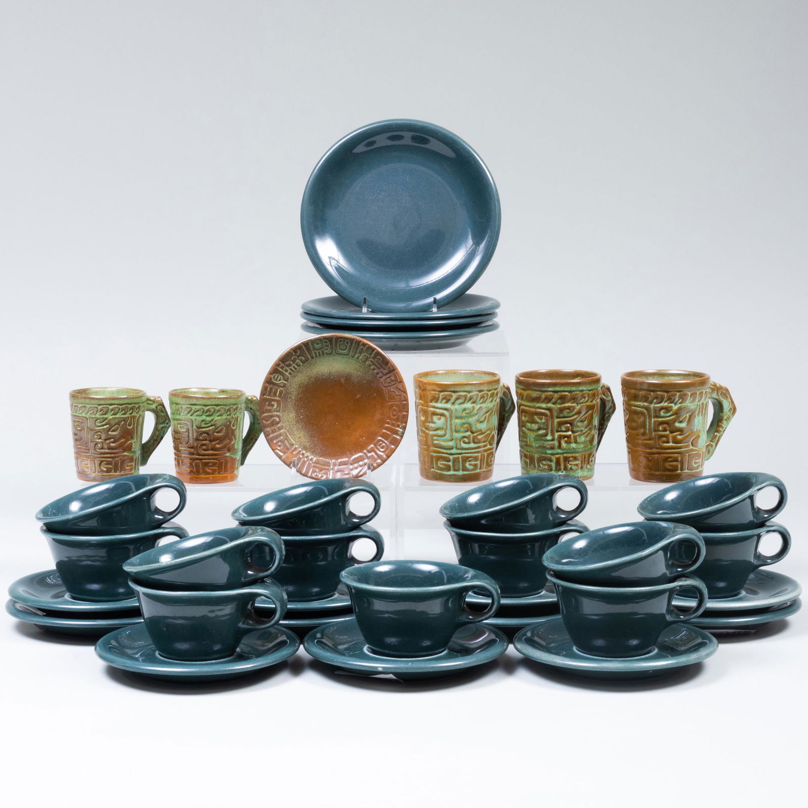 Set of Russel Wright Pottery and a Group of Frankoma: Set of Russel Wright Pottery and a Group of Frankoma Aztec Inspired Pottery The Wright with stamped mark. Comprising: Thirteen coffee cups and eleven saucers Four small plates The French with stamped