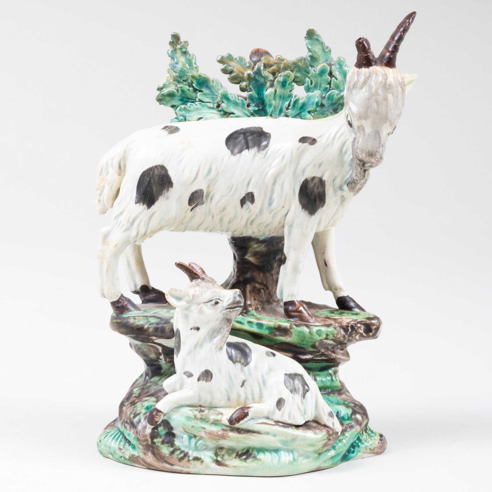 English Pearlware Bocage Figure of a Goat and Kid: English Pearlware Bocage Figure of a Goat and Kid 6 3/4 x 5 x 3 1/2 in.