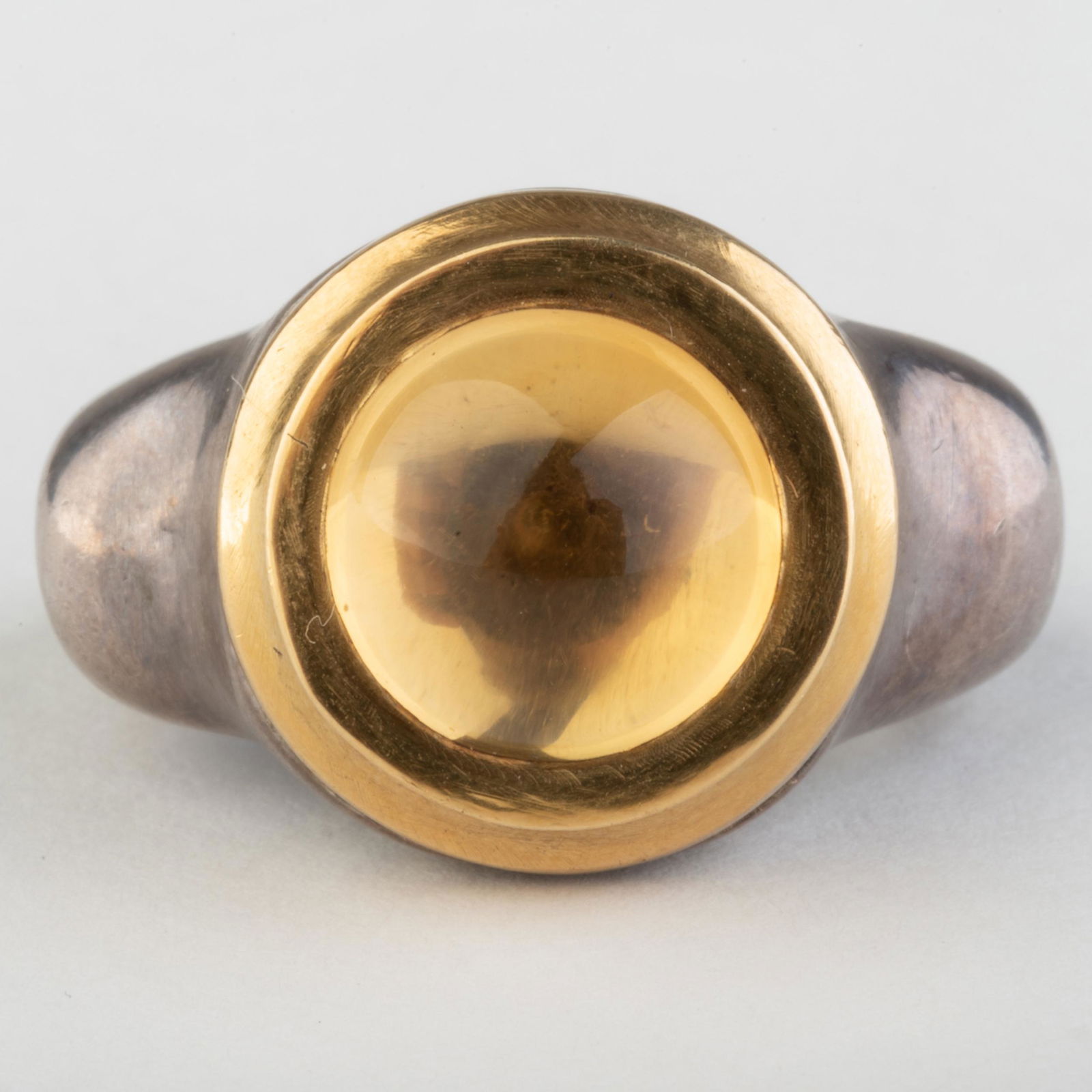 Modern Cabochon Citrine, Sterling Silver and 22k Gold: Modern Cabochon Citrine, Sterling Silver and 22k Gold Ring By Tom Swope, NYC, 1990's, marked 'Tom Swope/TS/Sterling/22k'. Size 8, 26.4 dwts. Property from the Collection of Tom Swope, Hudson, NY