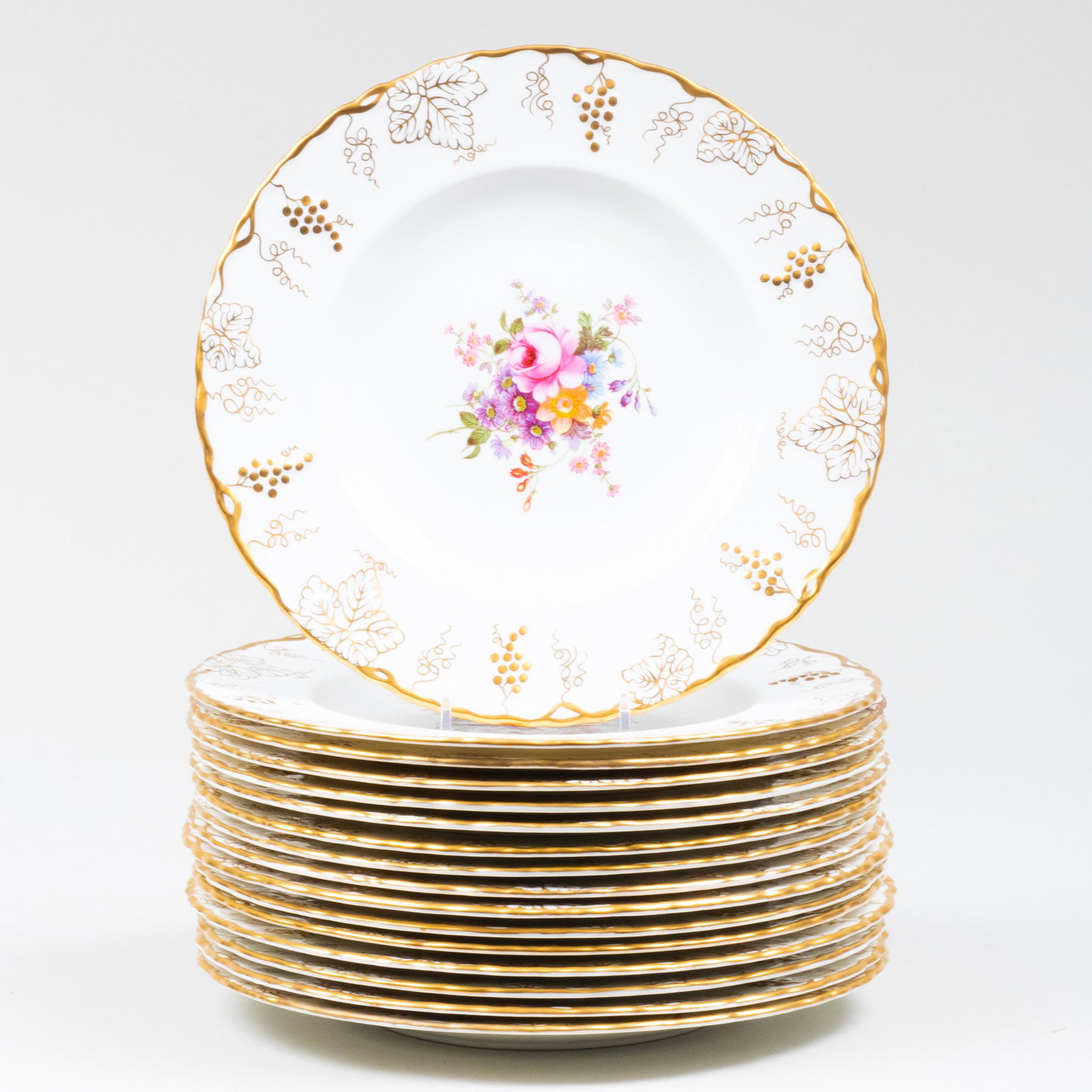 Set of Fourteen Royal Crown Derby Porcelain Dinner: Set of Fourteen Royal Crown Derby Porcelain Dinner Plates Green printed marks. Together with two restored and cracked plates. 10 in. diam. Property from the Estate of Audrey Zauderer
