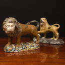 Two Staffordshire Pearl Glazed Models of Lions