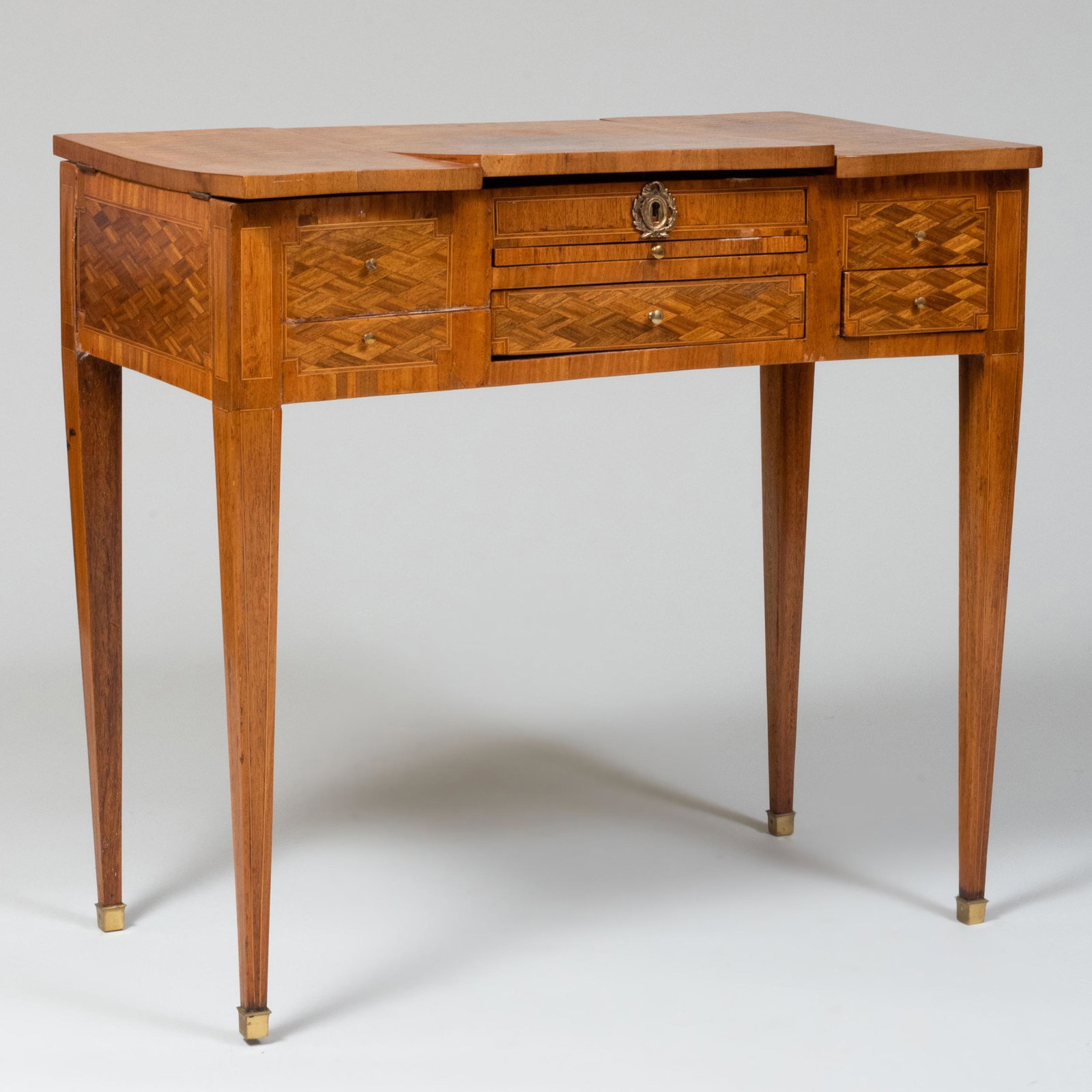 Louis XVI Style Kingwood and Tulipwood Parquetry Lady's: Louis XVI Style Kingwood and Tulipwood Parquetry Lady's Dressing Table 29 1/4 x 31 x 18 1/4 in. Property from the Collection of Ezra and Cecile Zilkha