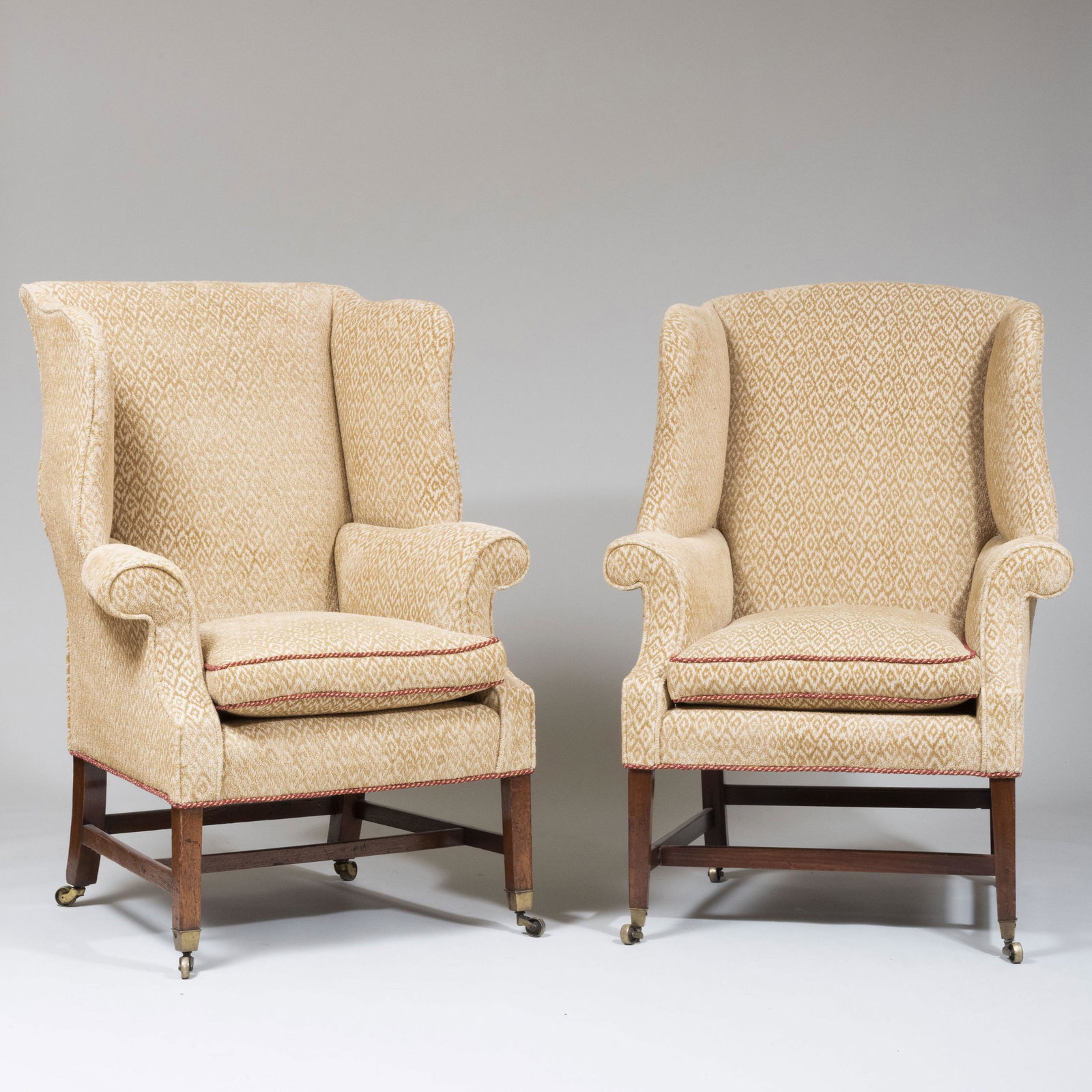 Near Pair of George III Style Mahogany and Upholstered: Near Pair of George III Style Mahogany and Upholstered Wing Chairs 45 1/2 x 33 x 24 1/2 in., height of seat 20 1/2 in. Estate of Don F. Gaston, Greenwich, Connecticut