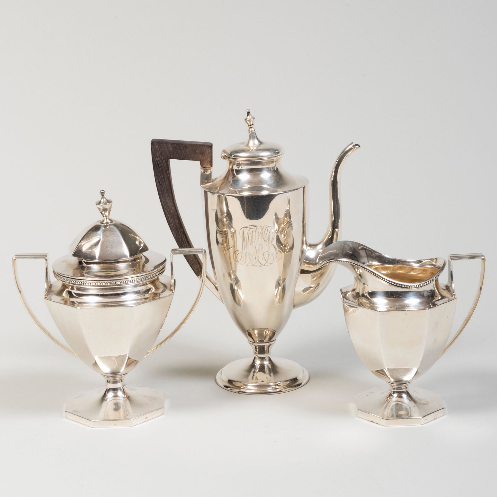 Caldwell Silver Coffee Pot and a Gorham Silver Cream: Caldwell Silver Coffee Pot and a Gorham Silver Cream Jug and Sugar Bowl Each marked 'sterling'; the coffee pot monogrammed. The coffee pot 8 3/4 x 6 1/2 x 3 1/4 in., 28.4 in. approx. gross weight.