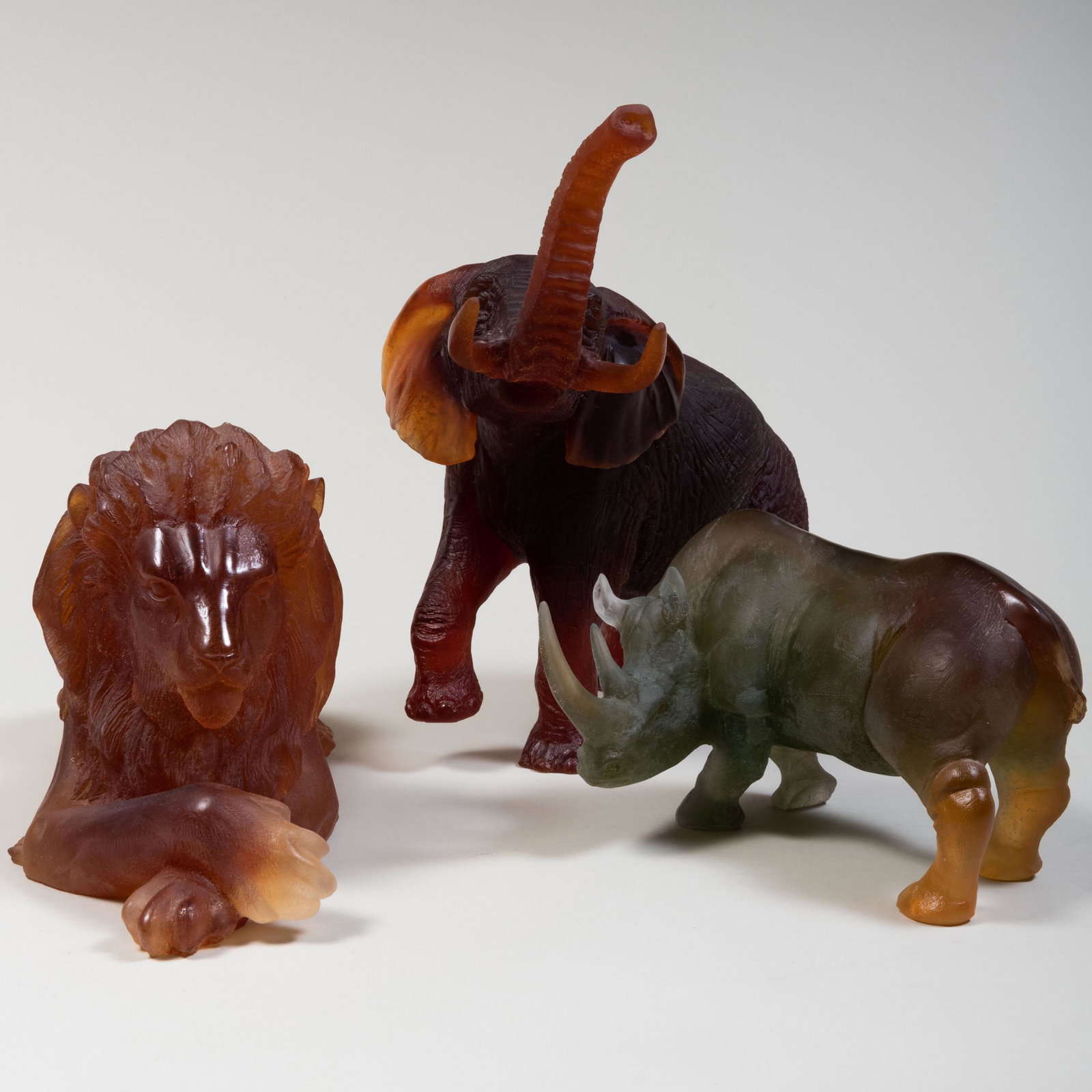 Group of Three Daum Pâte de Verre Models of: Group of Three Daum PÃ¢te de Verre Models of Animals Each signed in etch. Comprising: An elephant A rhinoceros A recumbent lion, numbered '440/1000' The lion 8 x 18 x 5 in. Property from an Importan