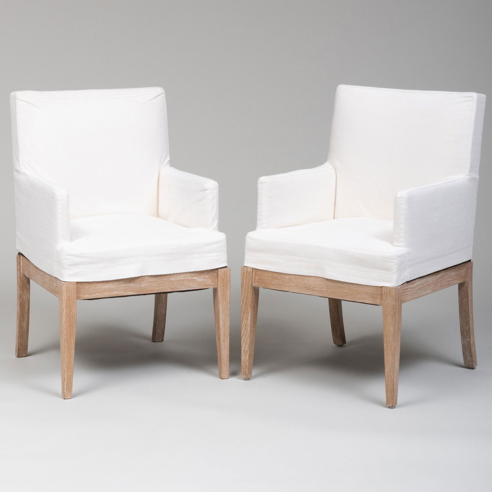 Pair of Modern Cerused Oak and Linen Armchairs, After a Design by Jean-Michel Frank: Pair of Modern Cerused Oak and Linen Armchairs, After a Design by Jean-Michel Frank 35 1/2 x 21 1/2 x 23 in., height of seat 19 in. Masterfully Decorated Homes: Property from the Collection of the Lat