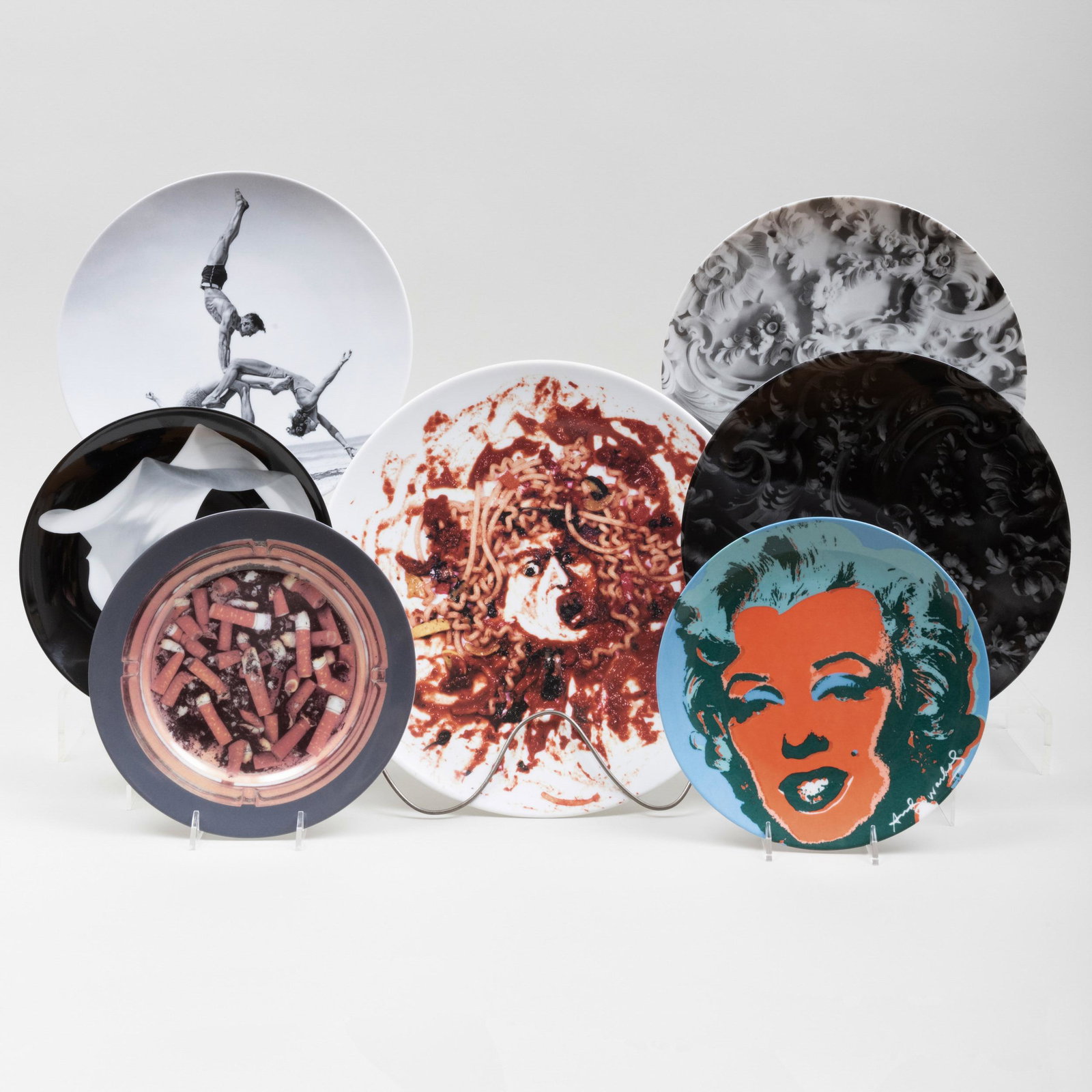 Various Artists: A Group of Seve Ceramic Plates: Various Artists: A Group of Eight Ceramic Plates Including: After Vik Muniz, The Norton Family Christmas Project, 1999; After Robert Mapplethorpe, Calla Lily, 1988; After Damien Hirst, Home Sweet Home