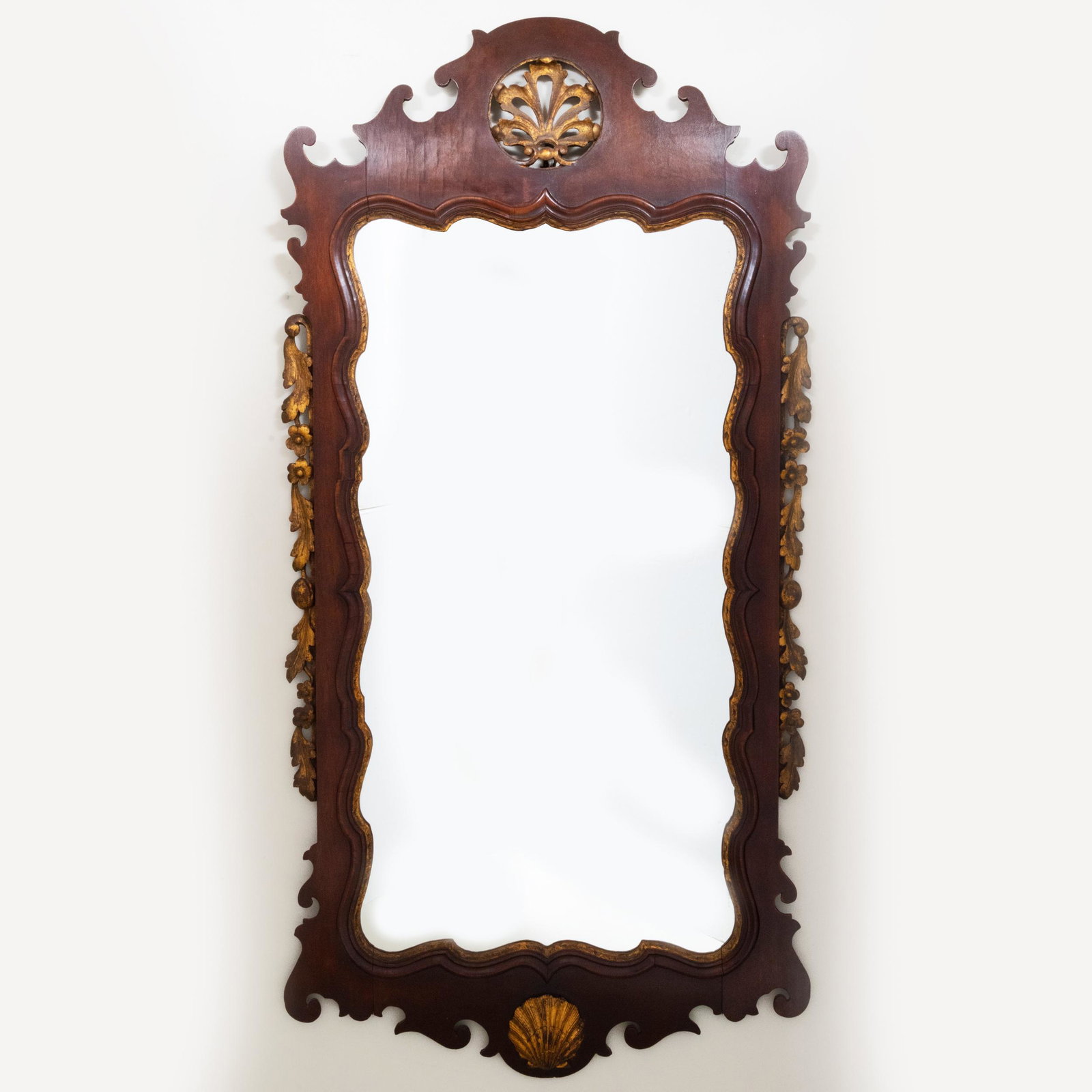 George III Style Mahogany and Parcel-Gilt Mirror: George III Style Mahogany and Parcel-Gilt Mirror 4 ft. 9 1/2 in. x 27 1/2 in. Estate of Don F. Gaston, Greenwich, Connecticut