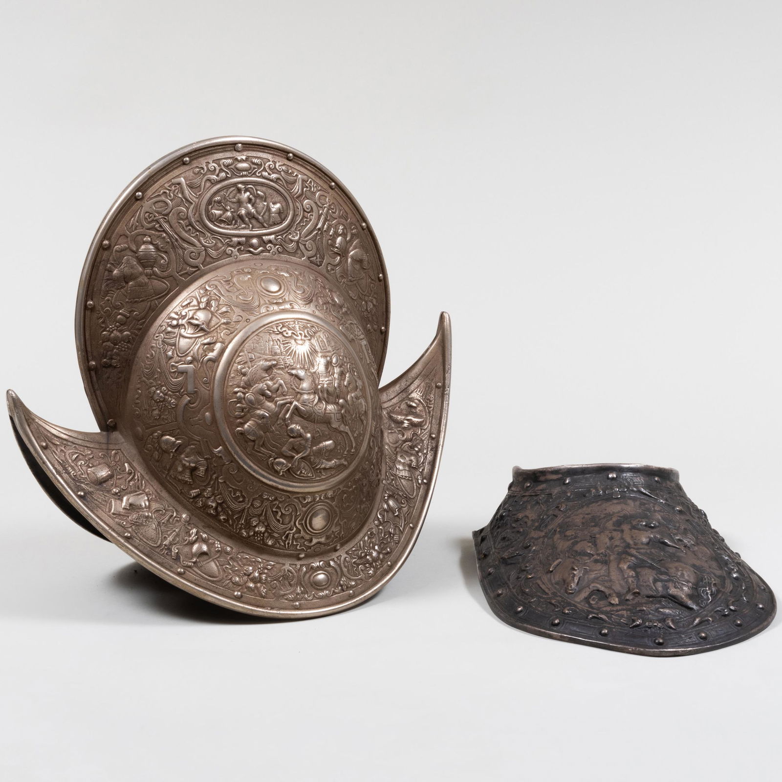 European Morian Metal Helmet and an Associated Metal Gorget: European Morian Metal Helmet and an Associated Metal Gorget 14 1/4 x 15 1/2 x 8 3/4 in., the helmet. Sold Bruun-Rasmussen, Bredgade, Denmark, October 1, 2008, Lot 6069. Property from the Estate of Dav