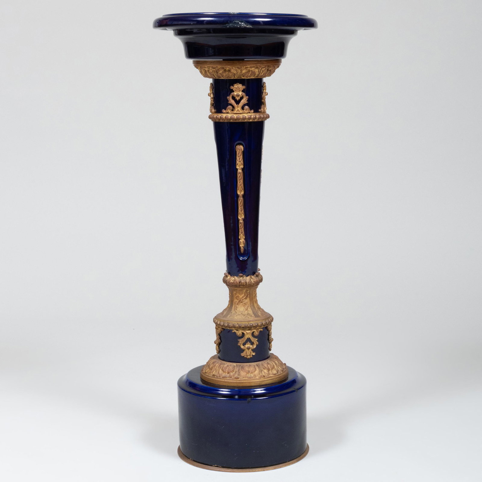 French Louis XIV Style Gilt-Metal-Mounted Cobalt Glazed Pedestal: French Louis XIV Style Gilt-Metal-Mounted Cobalt Glazed Pedestal 33 x 12 1/2 in. diam. The Regal Collection Part II, Dargate Auctions, McKees Rocks, PA, August 21, 2009, Lot 690. Property from the Est