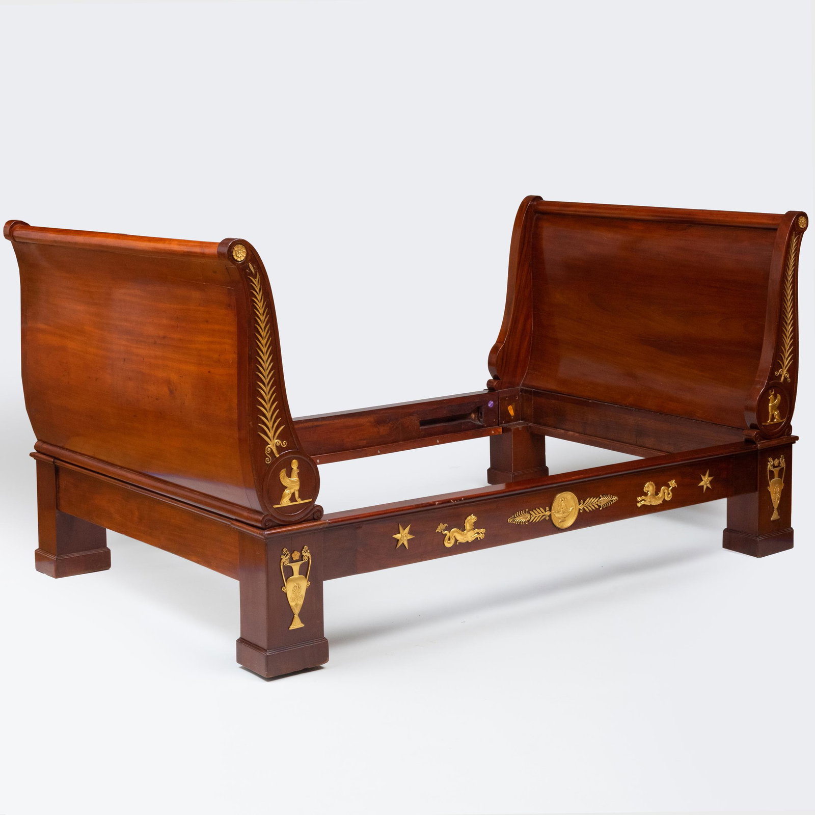 Empire Ormolu-Mounted Mahogany Day Bed: Empire Ormolu-Mounted Mahogany Day Bed Altered in size. With a Sotheby's NY label 'sale 8270'. 46 x 4 ft. 5 in. x 7 ft.; interior dimension 6 ft. 4 in. x 4 ft. Arturo Ferrante, Rome; Sold Sotheby's, N