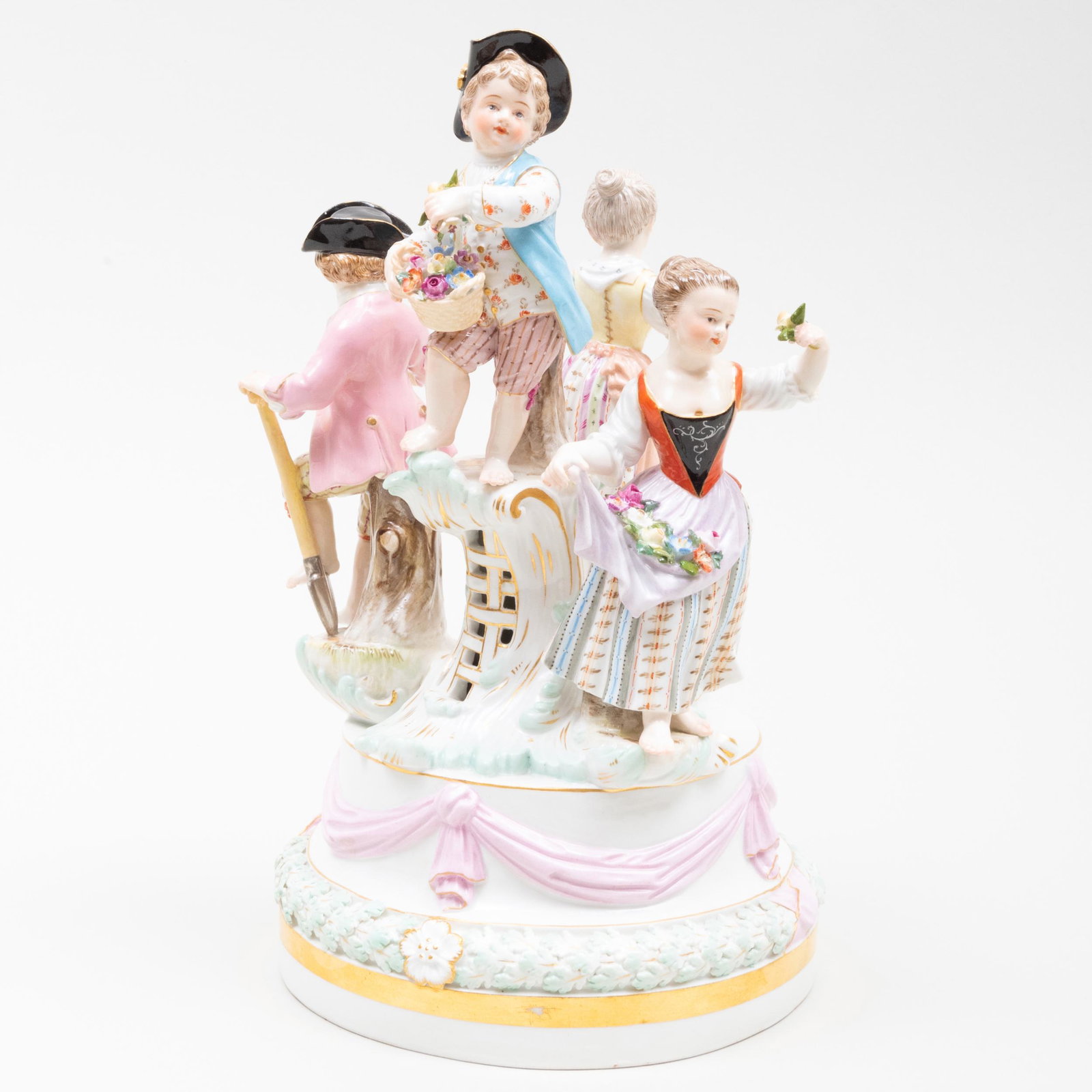 Meissen Porcelain Figural Group of Child Gardeners: Meissen Porcelain Figural Group of Child Gardeners Blue crossed swords mark. 10 1/2 x 6 in. diam.