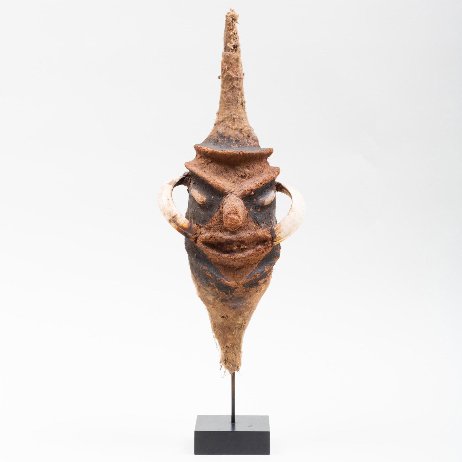 Ternes Nevimbur, Malekula Island Head of a Dance Staff, Vanuatu, Melanesia: Ternes Nevimbur, Malekula Island Head of a Dance Staff, Vanuatu, Melanesia Bark, bamboo, boar tusks, spider web, fiber, shells, pigments. The head 18 in.;21 1/4 x 7 1/4 x 6 in. (overall). Proper