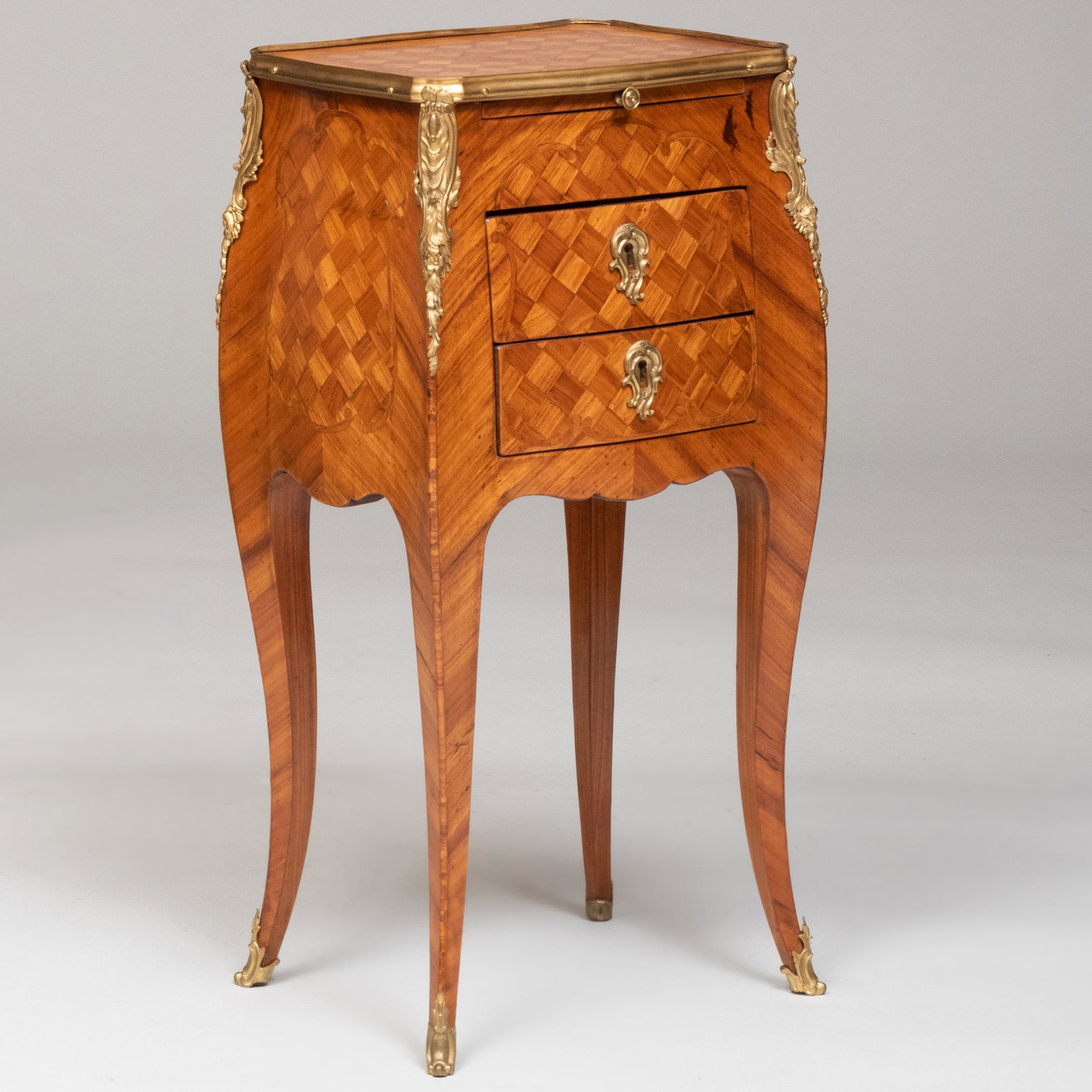 Louis XV Style Ormolu-Mounted Tulipwood Parquetry Table en Chiffonnière: Louis XV Style Ormolu-Mounted Tulipwood Parquetry Table en Chiffonnière 28 3/4 x 14 1/2 x 11 1/4 in. Property from a Kent, CT Collector