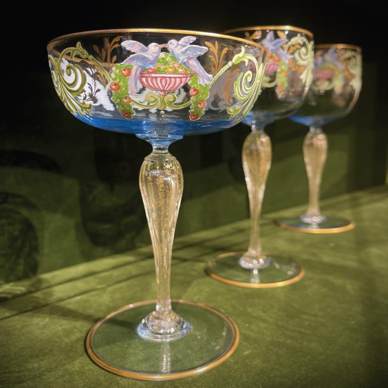 Murano Enameled Glass Table Service: Murano Enameled Glass Table Service Unmarked. Comprising: Eleven wine glasses Eleven small wine glasses Eleven champagne coupes Ten finger bowls and underplates The wine glasses 8 x 3 1/2 in. diam., (