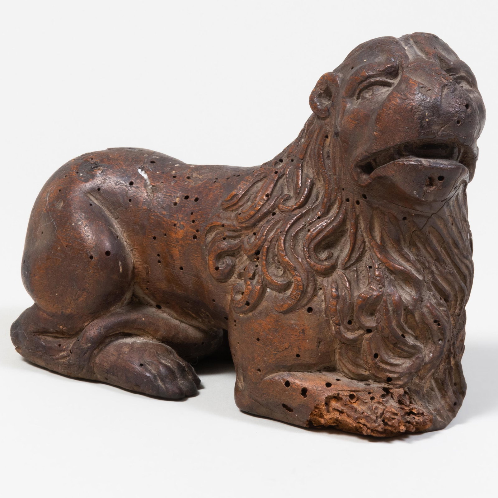 Continental Carved Wood Figure of a Lion, Possibly English: Continental Carved Wood Figure of a Lion, Possibly English 5 1/4 x 2 7/8 x 7 in. Property from the Estate of Ernest Kafka
