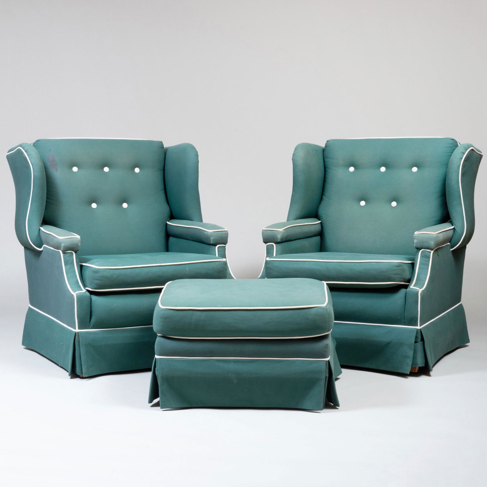 Pair of Upholstered Wing Chairs with Piping and a Matching Ottoman (1 of 16)