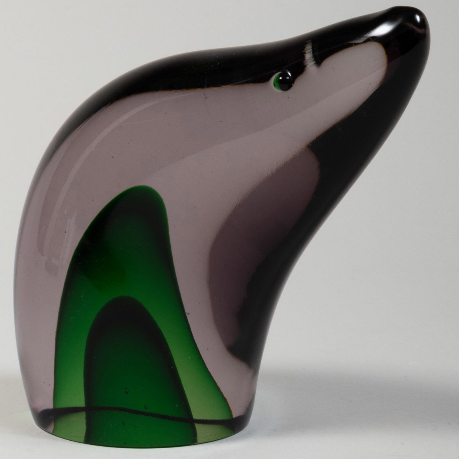 Murano Glass Figure of a Seal Head: Murano Glass Figure of a Seal Head Unsigned, with a lucite base. The seal 6 1/2 x 7 x 3 in., 8 1/2 x 8 x 4 in. (overall).