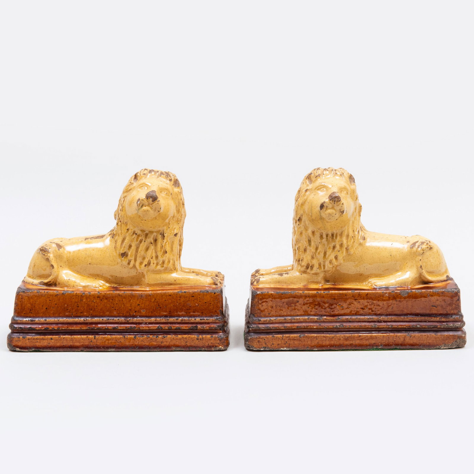 Pair of English Salt Glazed Earthenware Models of Lions: Pair of English Salt Glazed Earthenware Models of Lions Unmarked. 7 1/4 x 9 x 4 1/4 in. The Collection of Mary B. Schwab, Stoneleigh Horse Farm, Middleburg, VA.