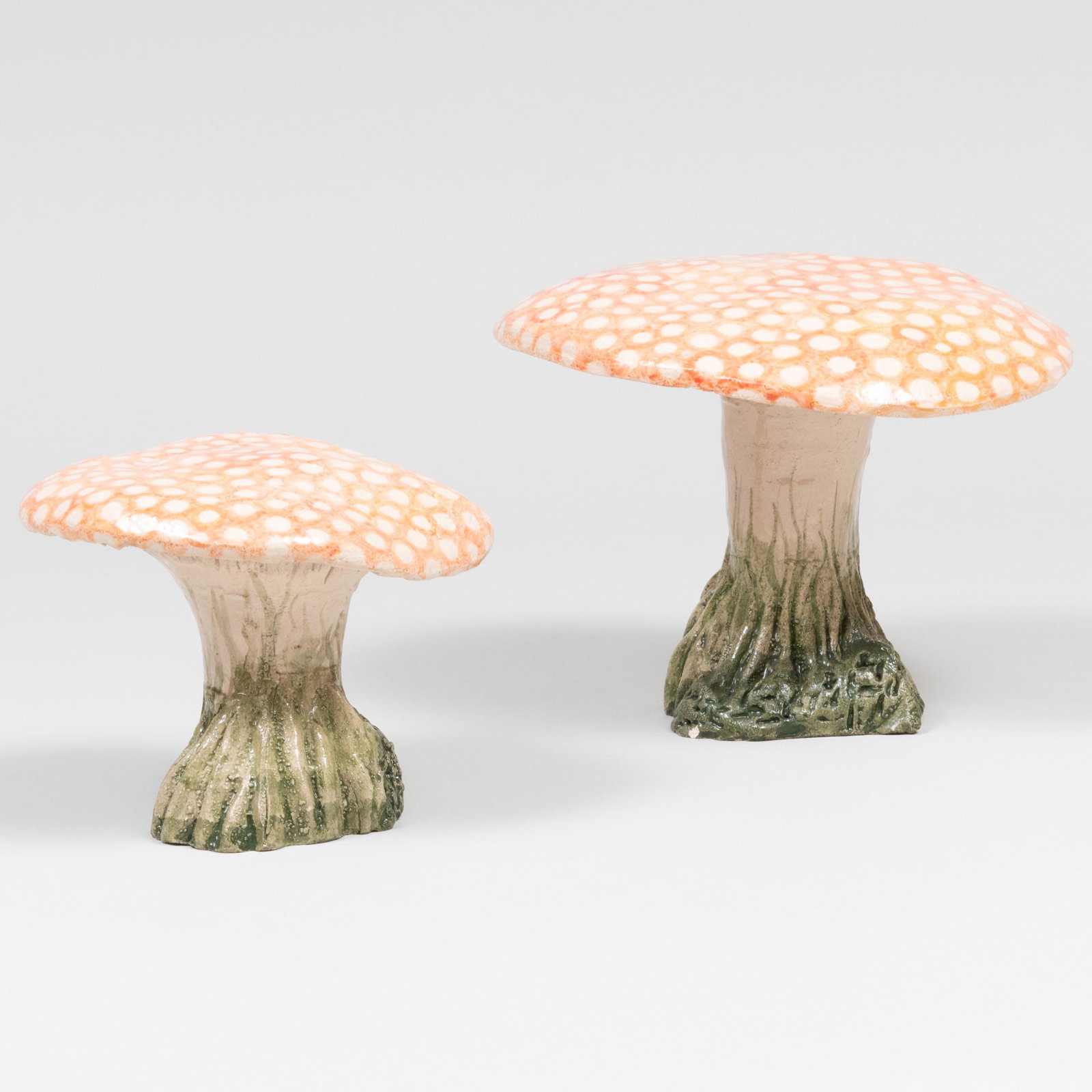 Two Astier de Villatte Earthenware Models of Mushrooms: Two Astier de Villatte Earthenware Models of Mushrooms Impressed marks. The larger 6 1/2 x 8 in. diam., the smaller 5 x 6 in. diam. 