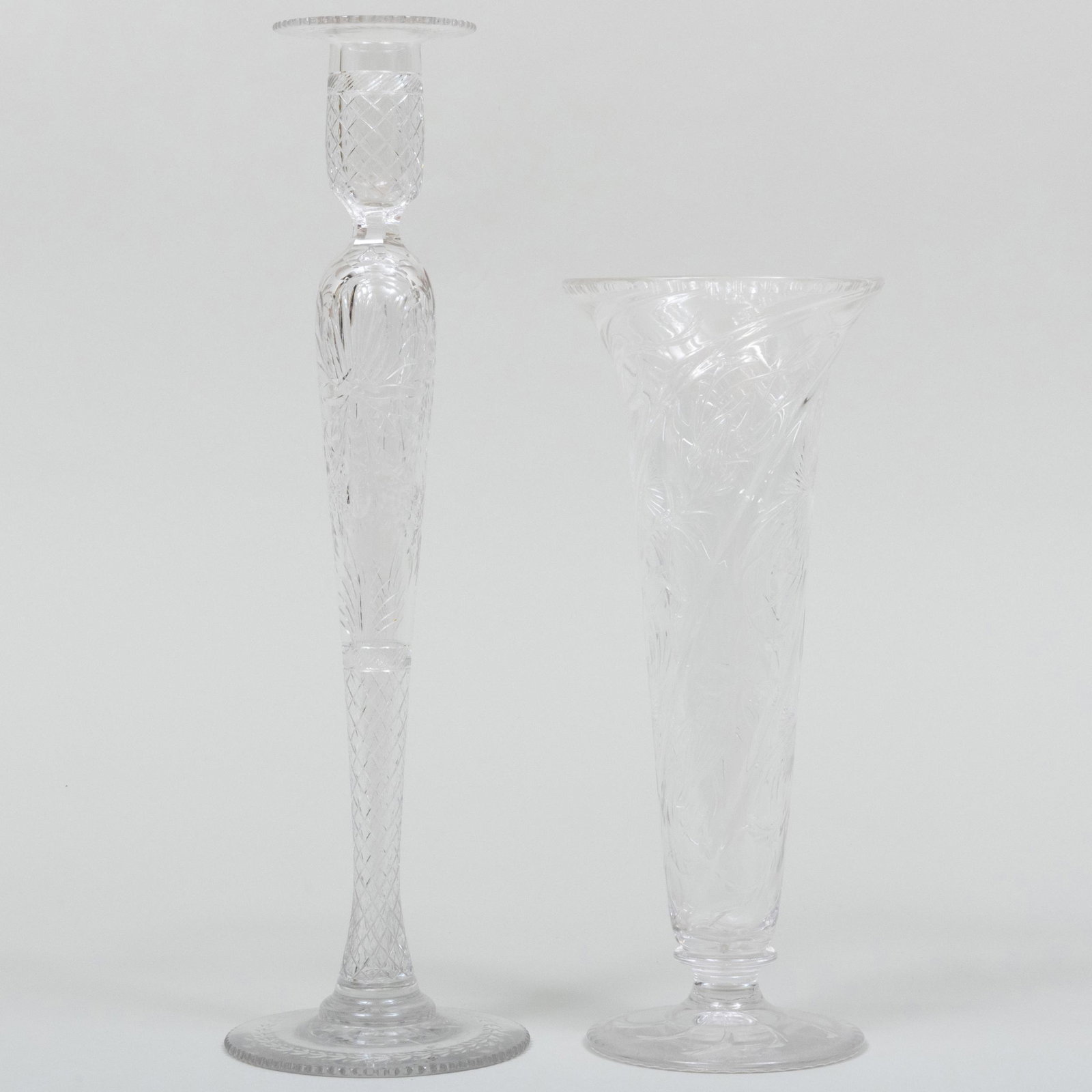Cut Glass Vase and a Cut Glass Candlestick, Probably English: Cut Glass Vase and a Cut Glass Candlestick, Probably English Unmarked. The vase 12 x 5 in. diam., 16 x 4 3/4 in. diam. 