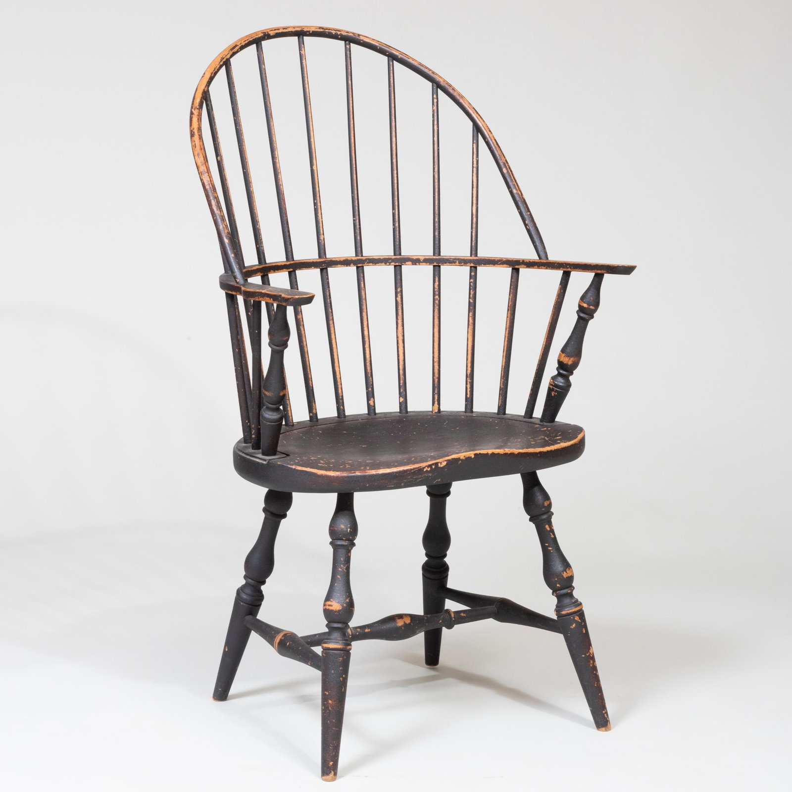 Black Painted Windsor Arm Chair, of Recent Manufacture.: Black Painted Windsor Arm Chair, of Recent Manufacture. 40 1/4 x 22 3/4 x 20 in., height of seat 17 1/2 in.
