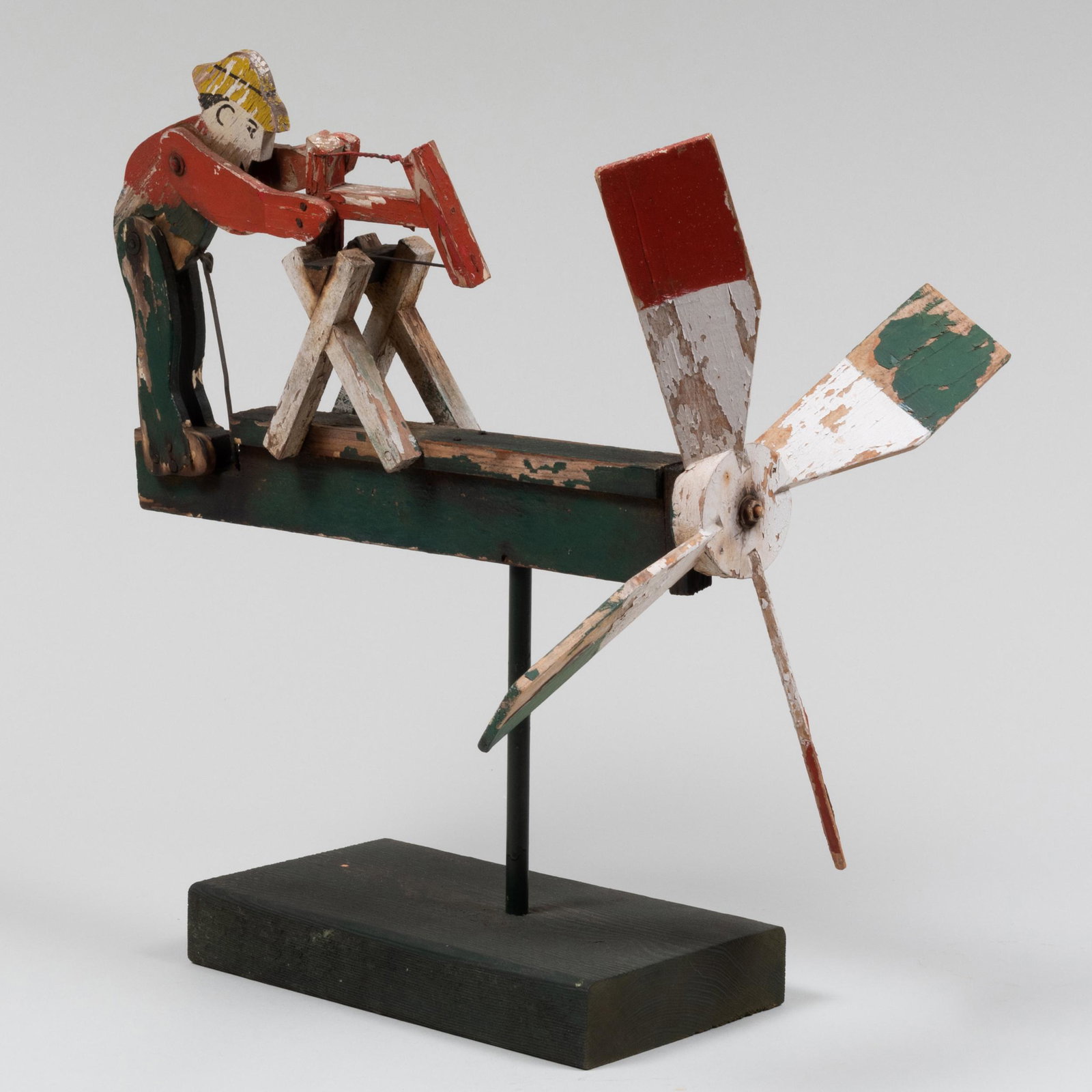 American Painted Wood Figural Whirligig on Stand: American Painted Wood Figural Whirligig on Stand 16 3/4 x 17 1/4 x 13 in. Property from The Collection of Alan Shayne and Norman Sunshine, Washington Depot, CT