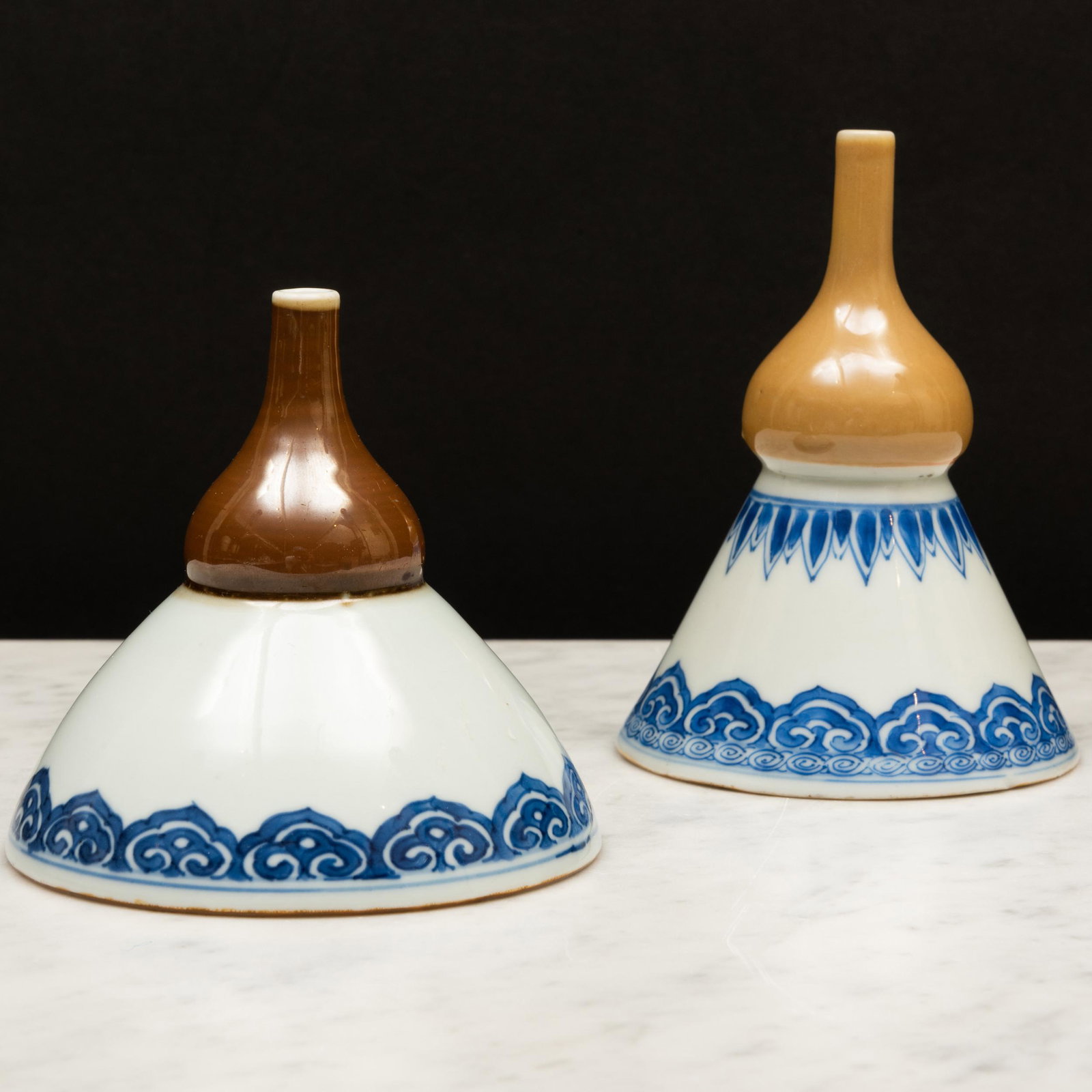Two Chinese Export Blue and White Café-au-Lait Ground Porcelain Wine Funnels: Two Chinese Export Blue and White CafÃ©-au-Lait Ground Porcelain Wine Funnels Unmarked. The larger 4 1/4 x 4 in. diam., the smaller 5 x 3 1/2 in. diam. Chinese Export Porcelain from the Tibor Collec