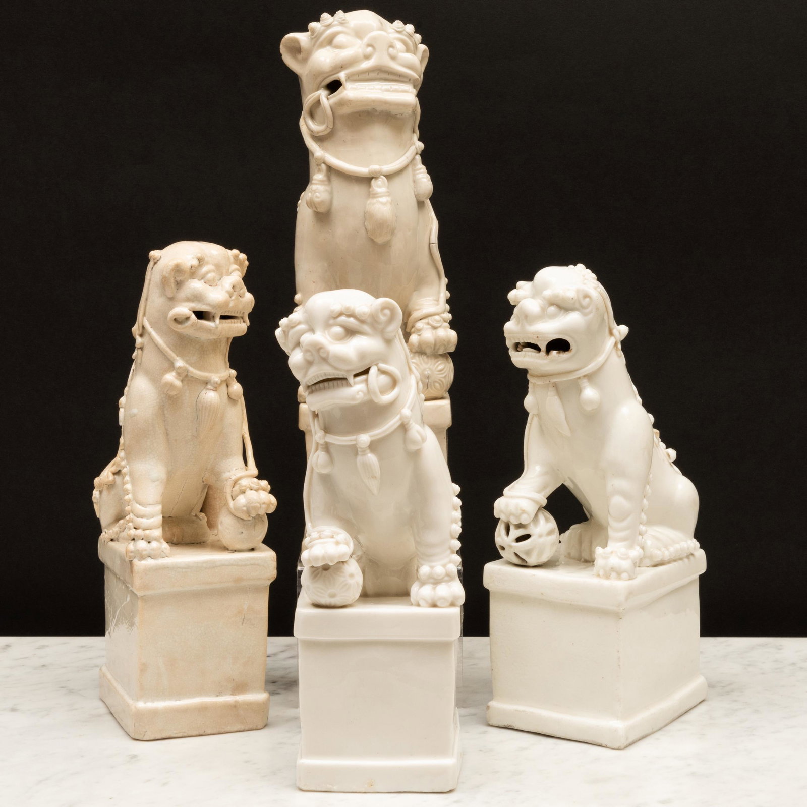 Group of Four Blanc de Chine Porcelain Buddhistic Lion Joss Stick Holders (1 of 20)