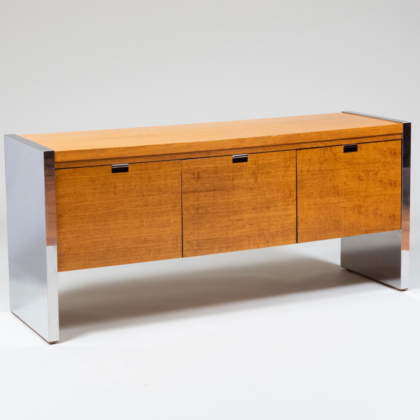 Pair of Robert Sprunger for Dunbar Oak and Chrome Credenzas: Pair of Robert Sprunger for Dunbar Oak and Chrome Credenzas Marked with 'D' tag 'DUNBAR' on left drawer. 27 1/2 x 5 ft. 1/2 x 18 1/4 in.