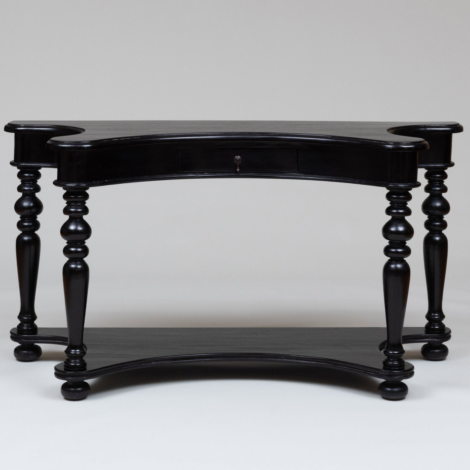 Baroque Style Concave Form Black Painted Console Table, of Recent Manufacture: Baroque Style Concave Form Black Painted Console Table, of Recent Manufacture With a paper label: 'LARS BOLANDER N.Y....Black Wishbone Console with Drawer...' 34 in. x 5 ft. 4 in. x 24 in. Property fr