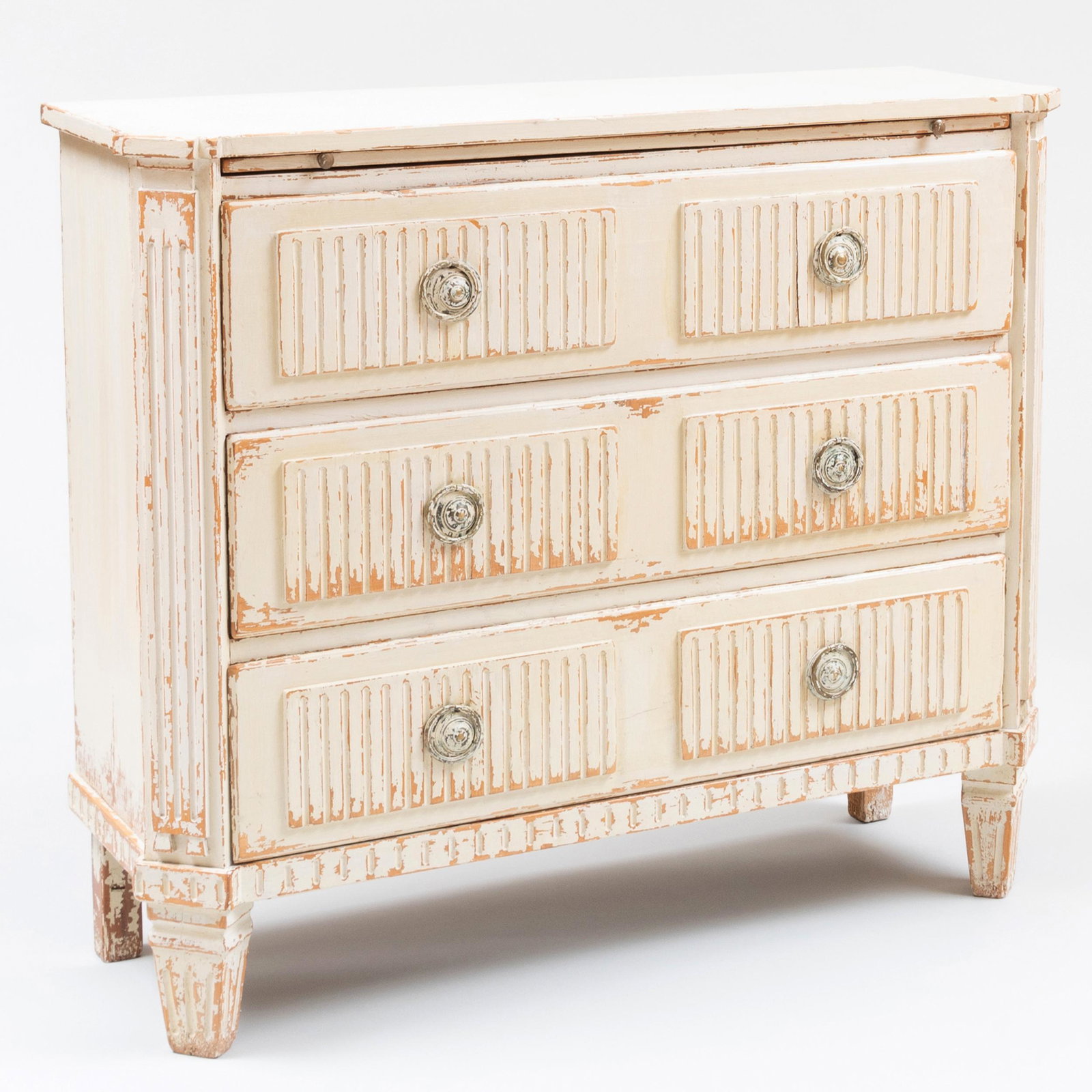 Swedish Neoclassical Style White Painted Chest of Drawers, of Recent Manufacture: Swedish Neoclassical Style White Painted Chest of Drawers, of Recent Manufacture Fitted with a brush slide. 37 x 43 x 14 1/2 in. Property from the Collection of Susan Lasker Brody