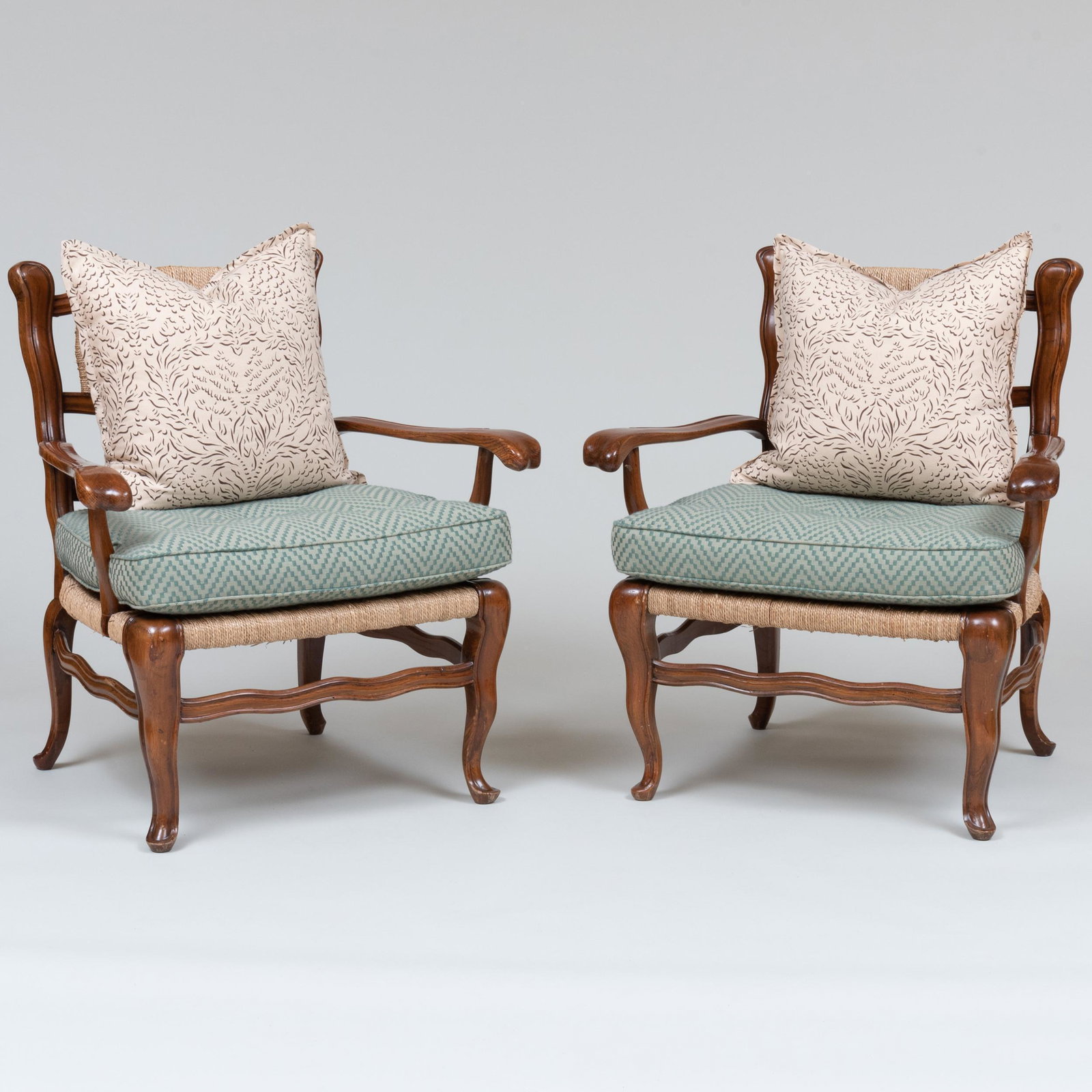 Pair of Louis XV Style Provincial Oak and Rush Ladder Back Armchairs: Pair of Louis XV Style Provincial Oak and Rush Ladder Back Armchairs Each fitted with a squab cushion and pillow. 33 x 30 1/2 x 22 1/2 in., height of seat 18 1/4 in. Property from the Collection of Su