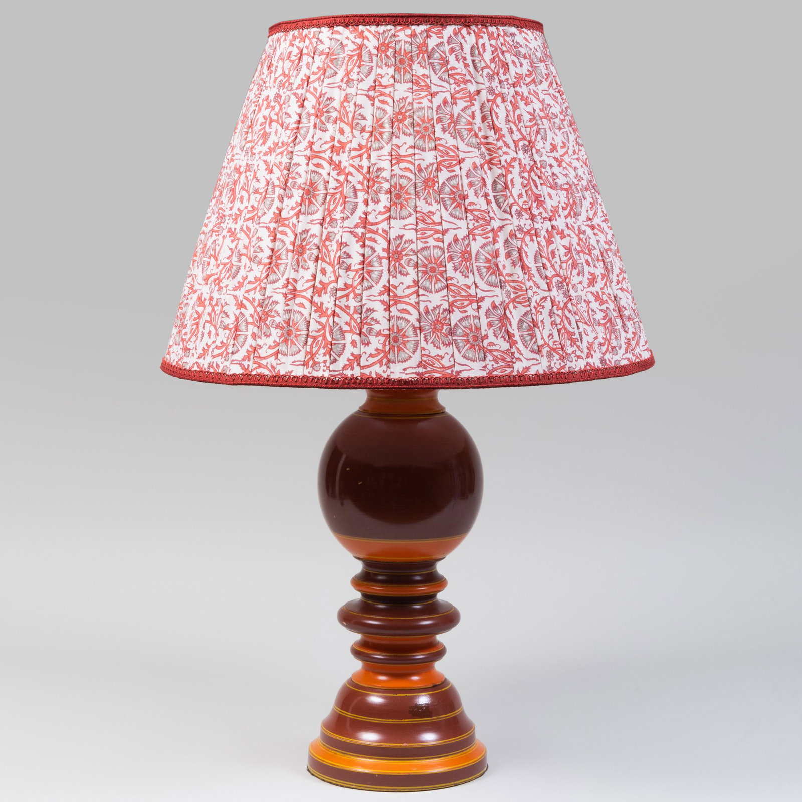 Contemporary Painted Turned Wood Lamp: Contemporary Painted Turned Wood Lamp With Robert Kime Indian Printed Pleated Shade. 34 1/4 x 8 1/2 in. diam.; the shade 22 in. diam. Property from the Collection of Susan Lasker Brody