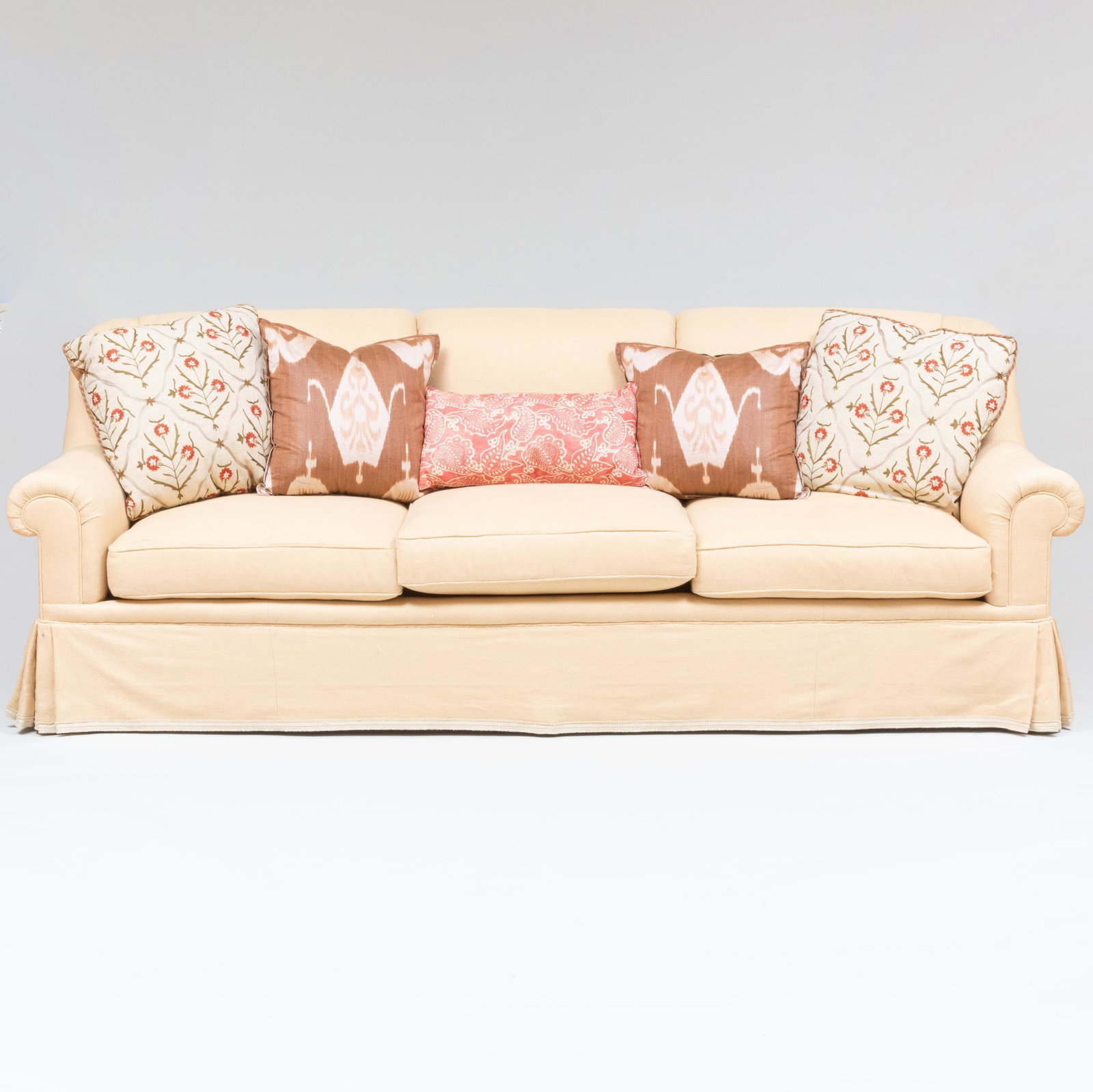 Beige Linen Upholstered Three Seat Sofa, A. Schneller Sons, Inc.: Beige Linen Upholstered Three Seat Sofa, A. Schneller Sons, Inc. Together with two sets of pillows and a lumbar pillow. 34 1/2 x 7 ft. 11 in. x 40 in., height of seat 19 in. Property from the Collecti