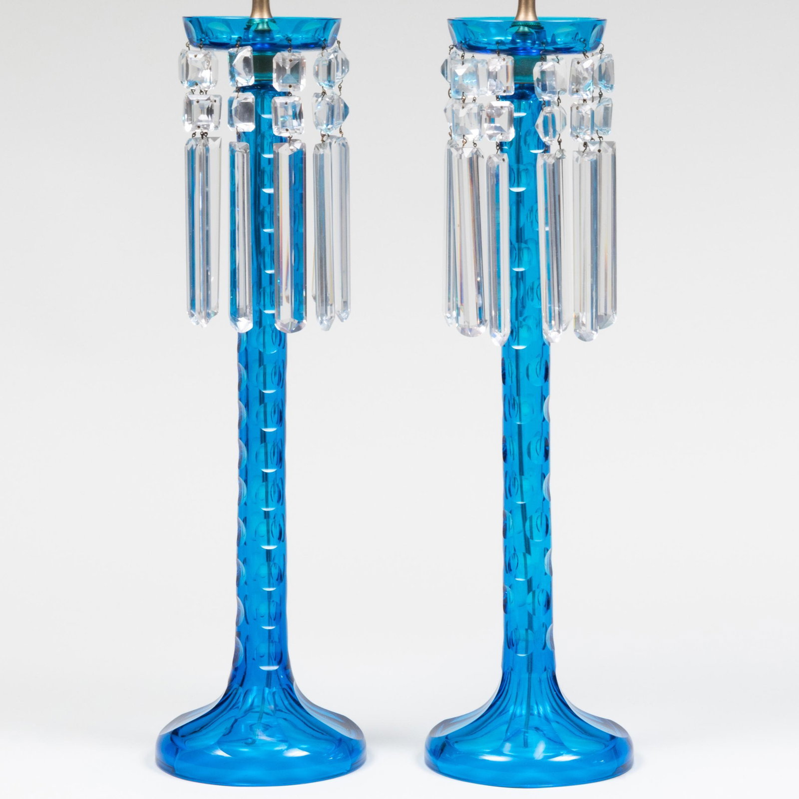Pair of Blue Glass Lusters Mounted asTable Lamps, Possibly Baccarat: Pair of Blue Glass Lusters Mounted asTable Lamps, Possibly Baccarat Fitted as table lamps. 34 3/4 x 6 1/2 in. diam. 