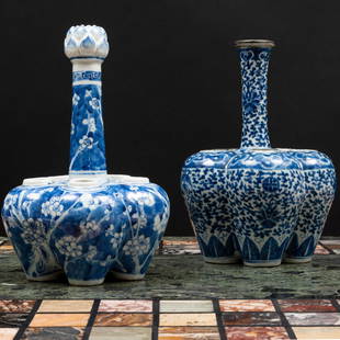 Two Chinese Blue and White Porcelain Garlic Mouthed Vases: Two Chinese Blue and White Porcelain Garlic Mouthed VasesUnmarked.The larger 10 1/4 x 7 in. diam., the smaller 10 x 6 1/2 in. diam.Master Class: John Rosselli at Home