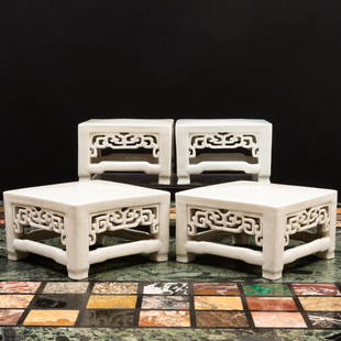 Two Pairs of Chinese White Glazed Porcelain Stands: Two Pairs of Chinese White Glazed Porcelain Stands Unmarked. The larger 3 1/2 x 5 3/4 x 5 3/4 in., the smaller 3 x 5 x 5 in. Master Class: John Rosselli at Home