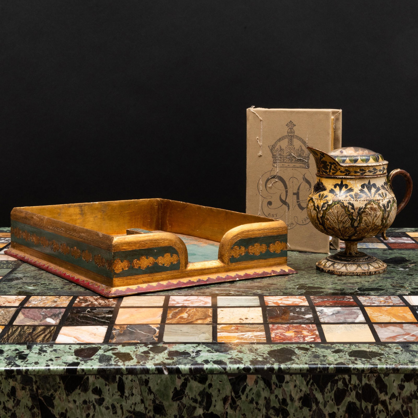 Group of Desk Articles: Group of Desk Articles Comprising: A Florentine parcel-gilt and painted tooled letter holder with cover A painted wood and faux flower vessel, with the label: 'Freundschaft' (Friendship) A fabric wrap