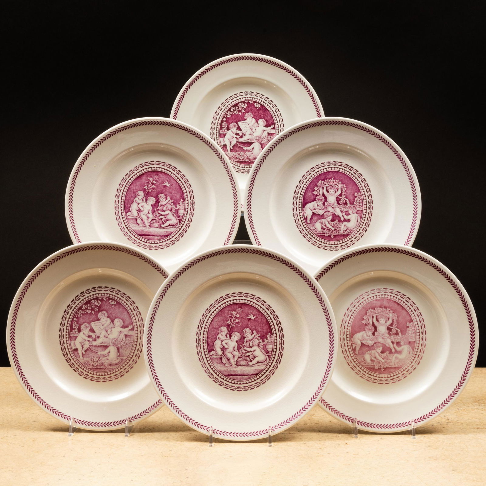 Set of Twelve Wedgwood Puce Decorated Plates in the 'Cipriani' Pattern: Set of Twelve Wedgwood Puce Decorated Plates in the 'Cipriani' Pattern Impressed and puce printed marks. 8 3/4 in. diam.