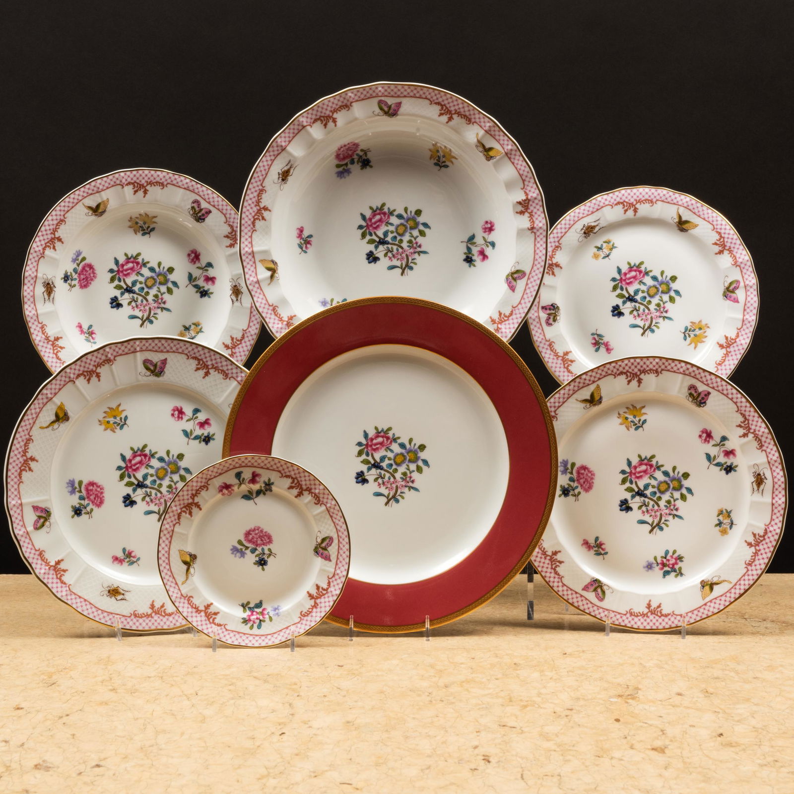 Assembled Bernardaud Porcelain Dinner Service: Assembled Bernardaud Porcelain Dinner Service Gilt and blue printed marks. Comprising: Seventeen chargers Fifteen dinner plates Twenty-two lunch plates Eighteen salad plates Eighteen soup plates Eigh