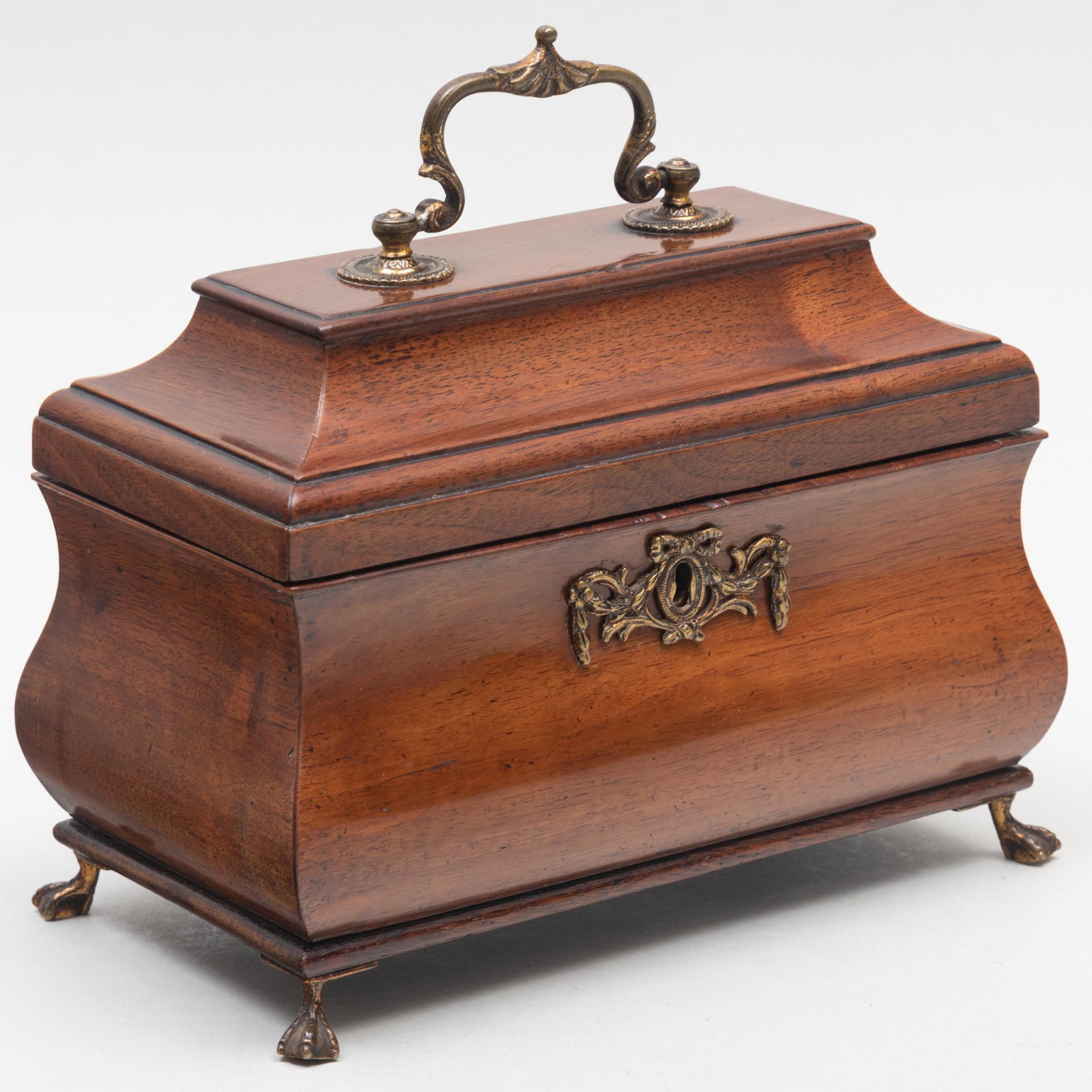 Dutch Rococo Gilt-Metal-Mahogany Bombé Tea Chest: Dutch Rococo Gilt-Metal-Mahogany Bombé Tea Chest 6 1/4 x 8 1/2 x 4 3/4 in. Property from the Collections of Lloyd F. and Linda F. Crawley