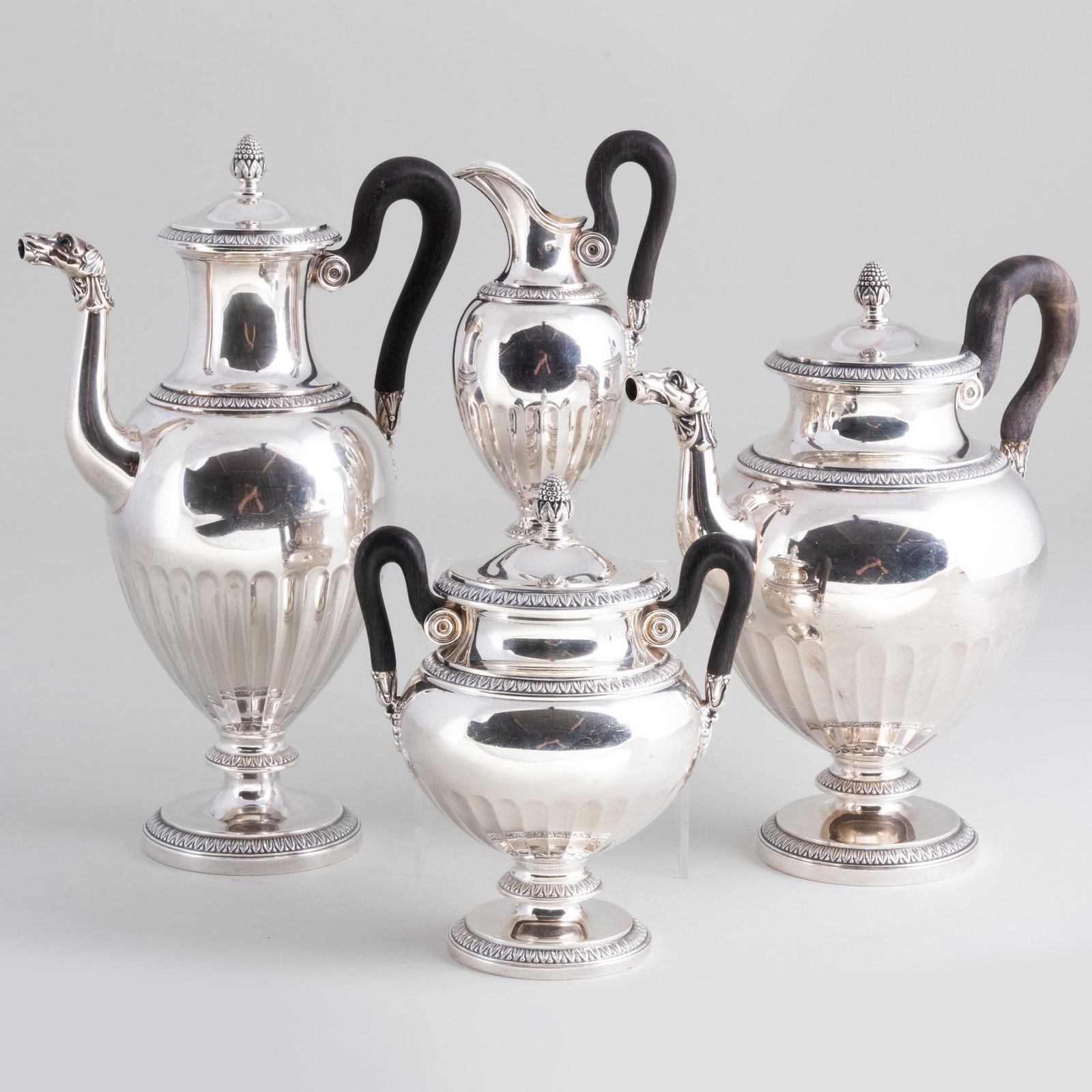 Cardeilhac Silver Four-Piece Tea and Coffee Service: Cardeilhac Silver Four-Piece Tea and Coffee Service Marked '.950'. Comprising: A teapot with hinged cover A coffee pot with hinged cover A sugar bowl and cover A cream jug The coffee pot 11 x 7 x 4 in