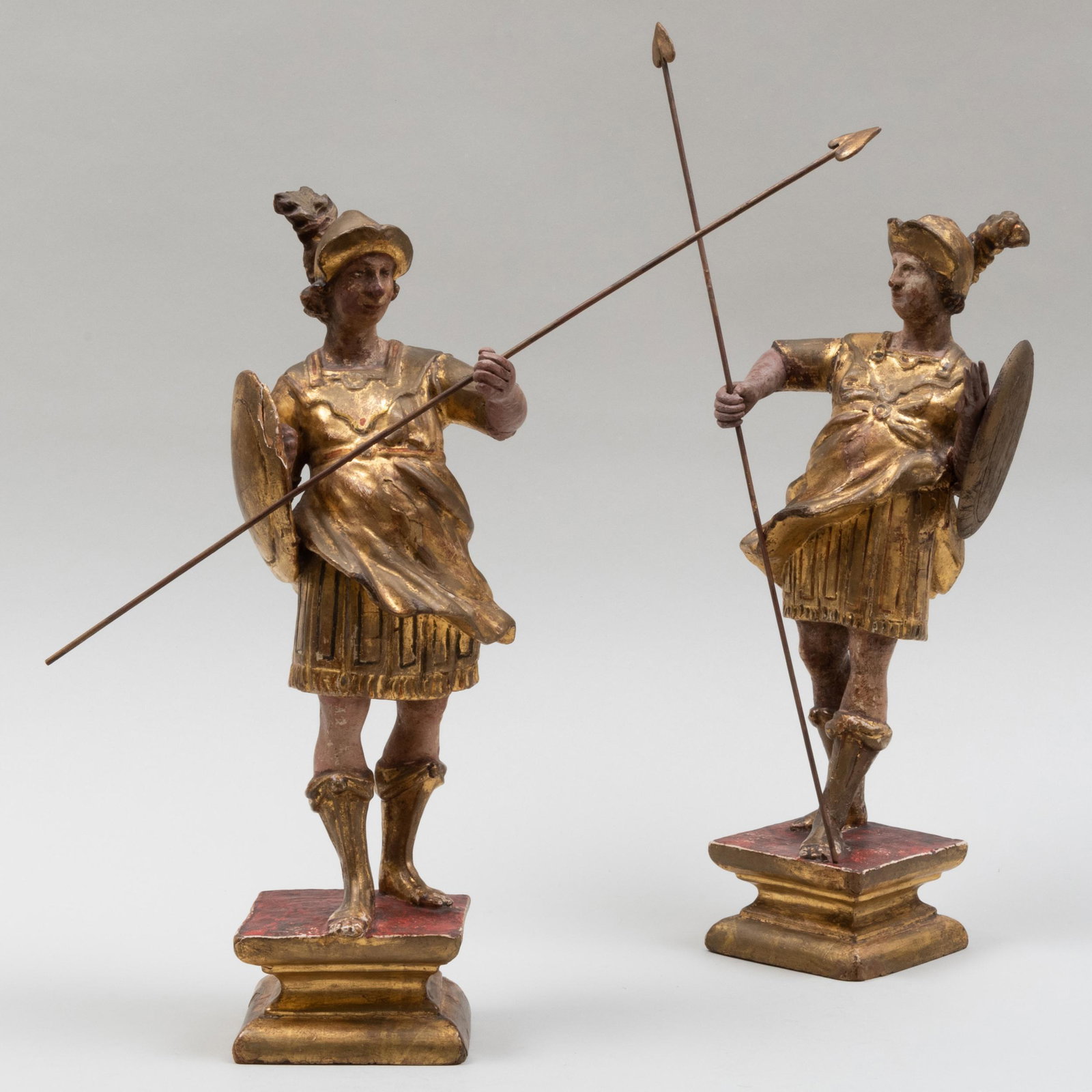Pair of Continental Painted and Parcel-Gilt Roman Foot Soldiers on Stands: Pair of Continental Painted and Parcel-Gilt Roman Foot Soldiers on Stands The figures 15 3/4 x 5 1/2 x 5 in.