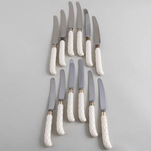 Set of Twelve English Porcelain Handled Dinner Knives and Twelve Lunch Knives, After Syrie Maugham: Set of Twelve English Porcelain Handled Dinner Knives and Twelve Lunch Knives, After Syrie MaughamThe dinner knives 10 1/2 in. long, the lunch knives 9 in. long.