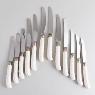 Set of Twelve English Porcelain Handled Dinner Knives and Twelve Lunch Knives, After Syrie Maugham: Set of Twelve English Porcelain Handled Dinner Knives and Twelve Lunch Knives, After Syrie Maugham The dinner knives 10 1/2 in. long, the lunch knives 9 in. long.