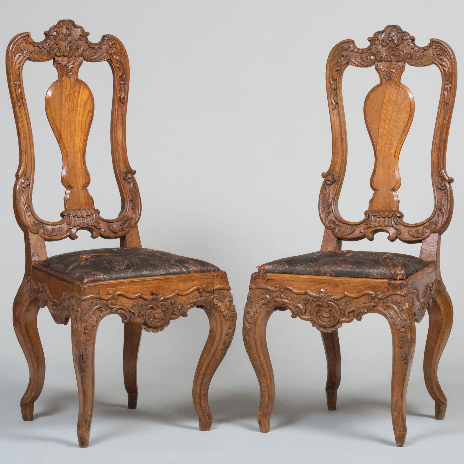 Pair of Dutch Rococo Style Carved Oak Side Chairs with Painted and Embossed Leather Seats (1 of 13)
