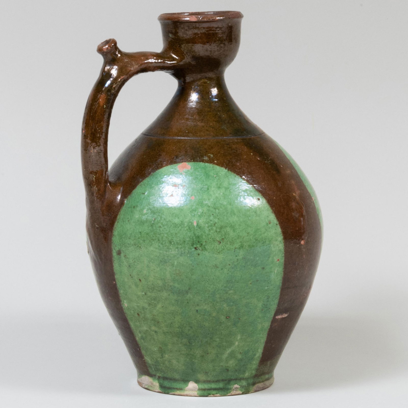 Brown and Green Glazed Earthenware Puzzle Jug (1 of 7)